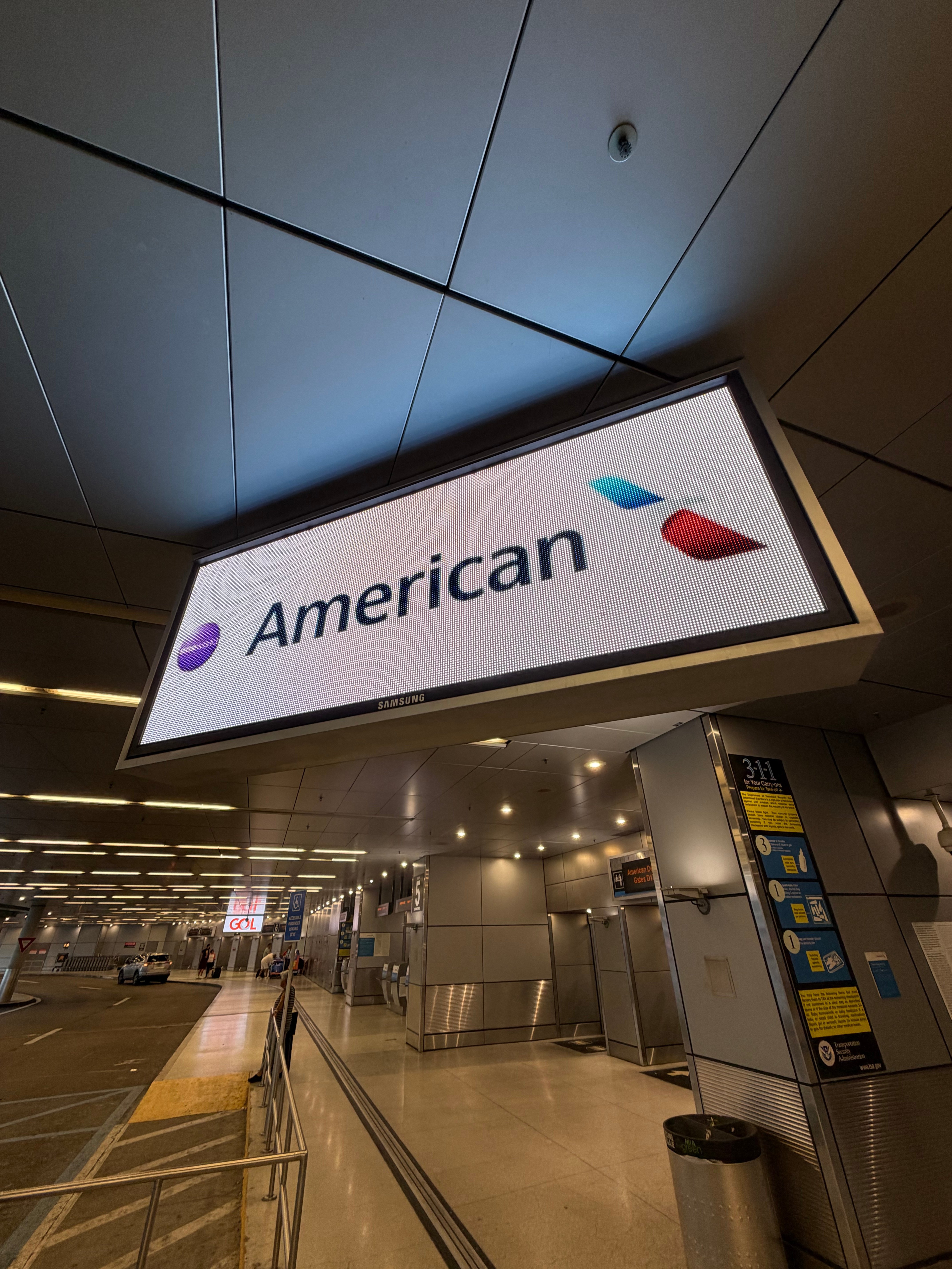 American Airlines sign above the check in area at Miami International Airport.