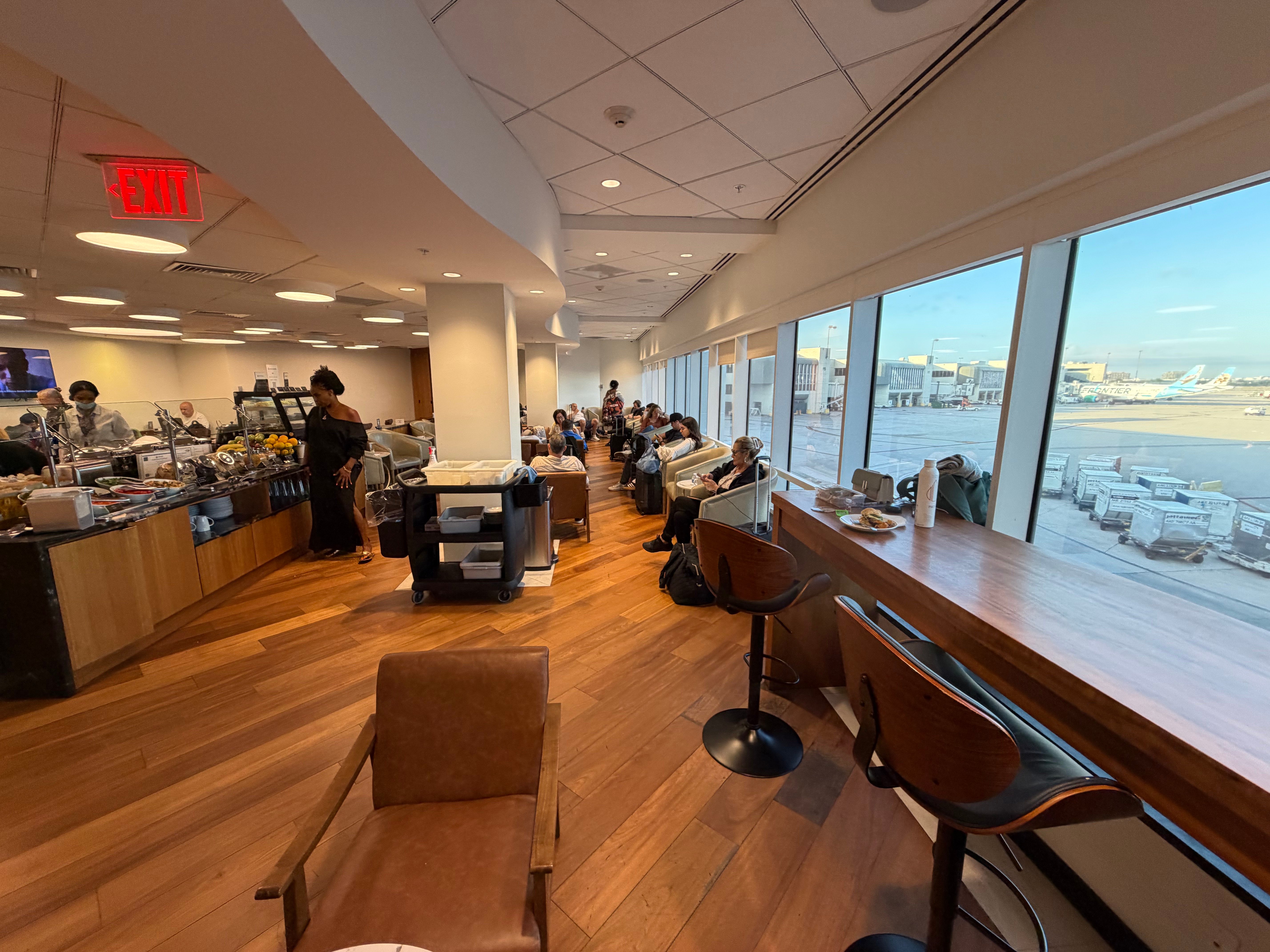 Window seating inside the Turkish Airlines Lounge in Miami Concourse E.