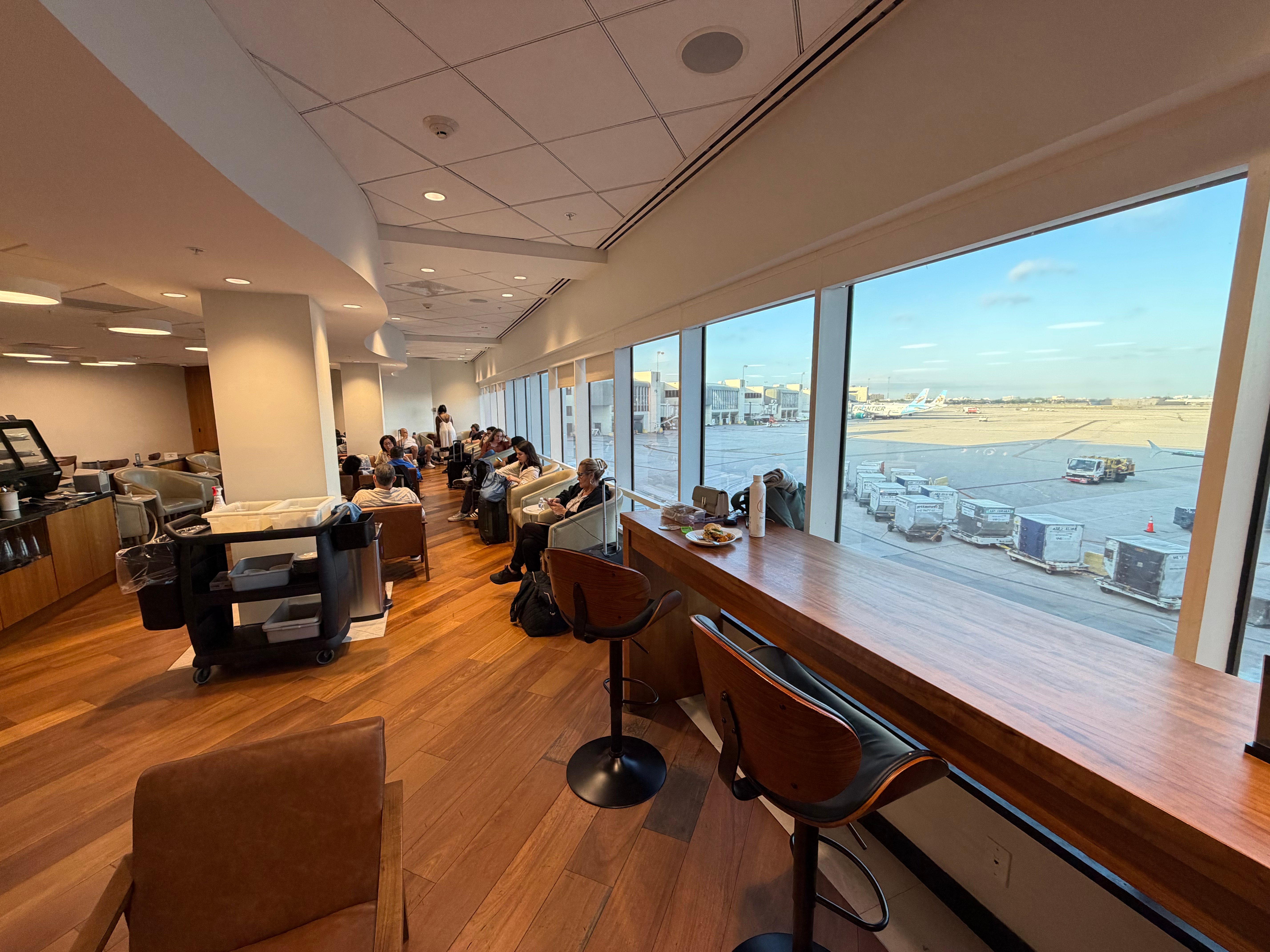 Counter seating beside the windows in the Turkish Airlines Lounge.