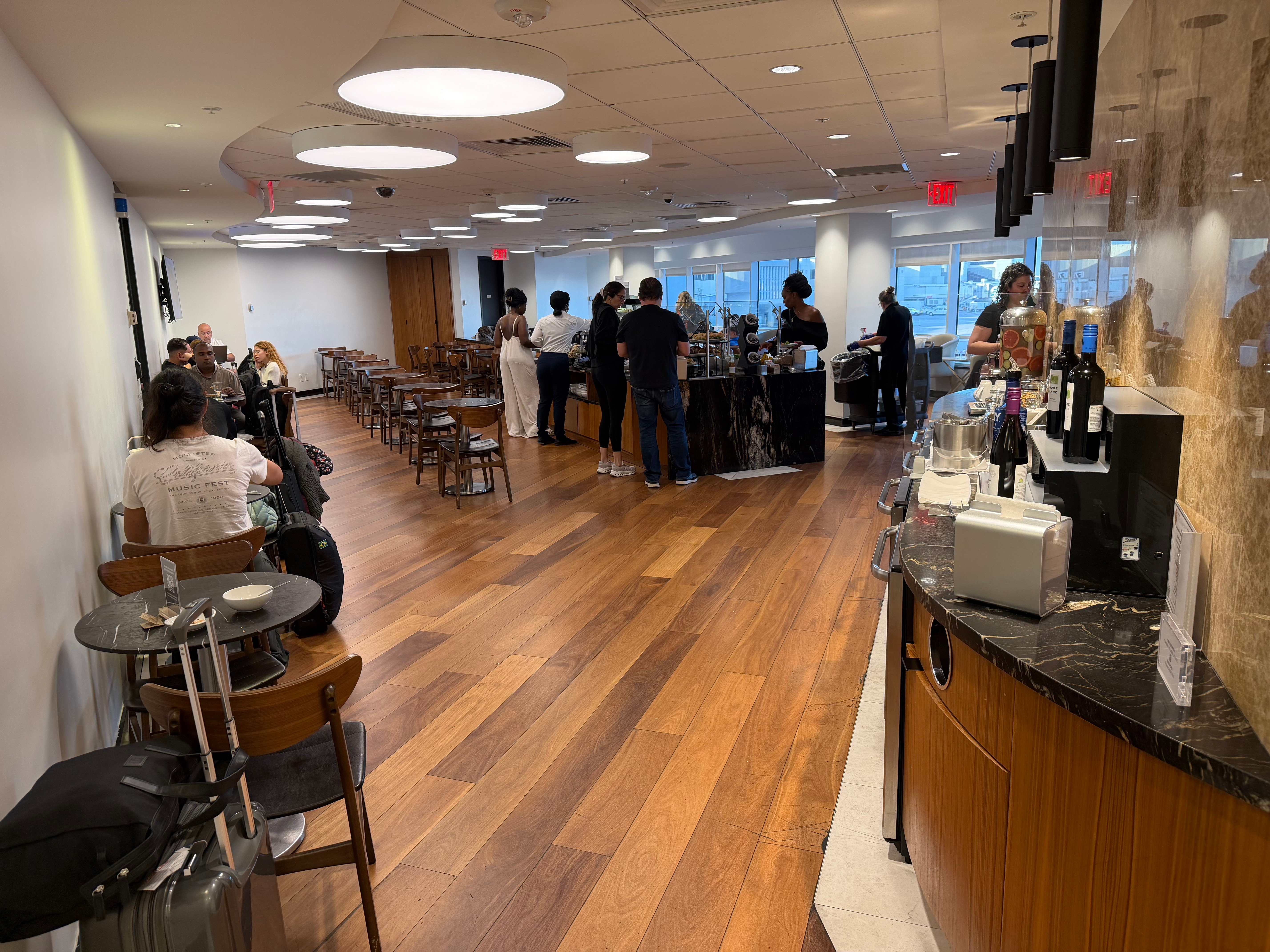 Crowded interior of the Turkish Airlines Lounge in Miami.