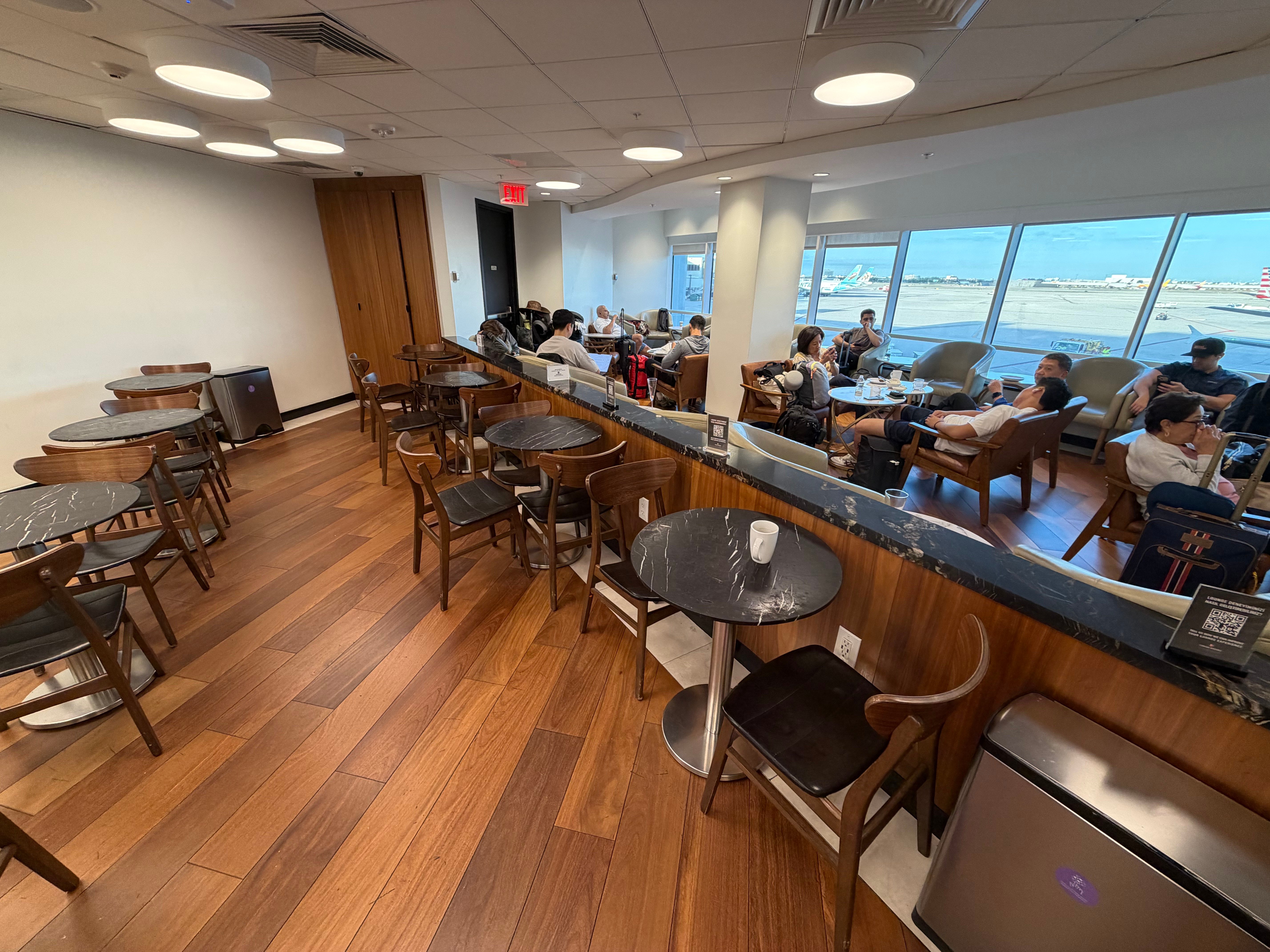 Seats along the windows inside the Turkish Airlines Lounge.