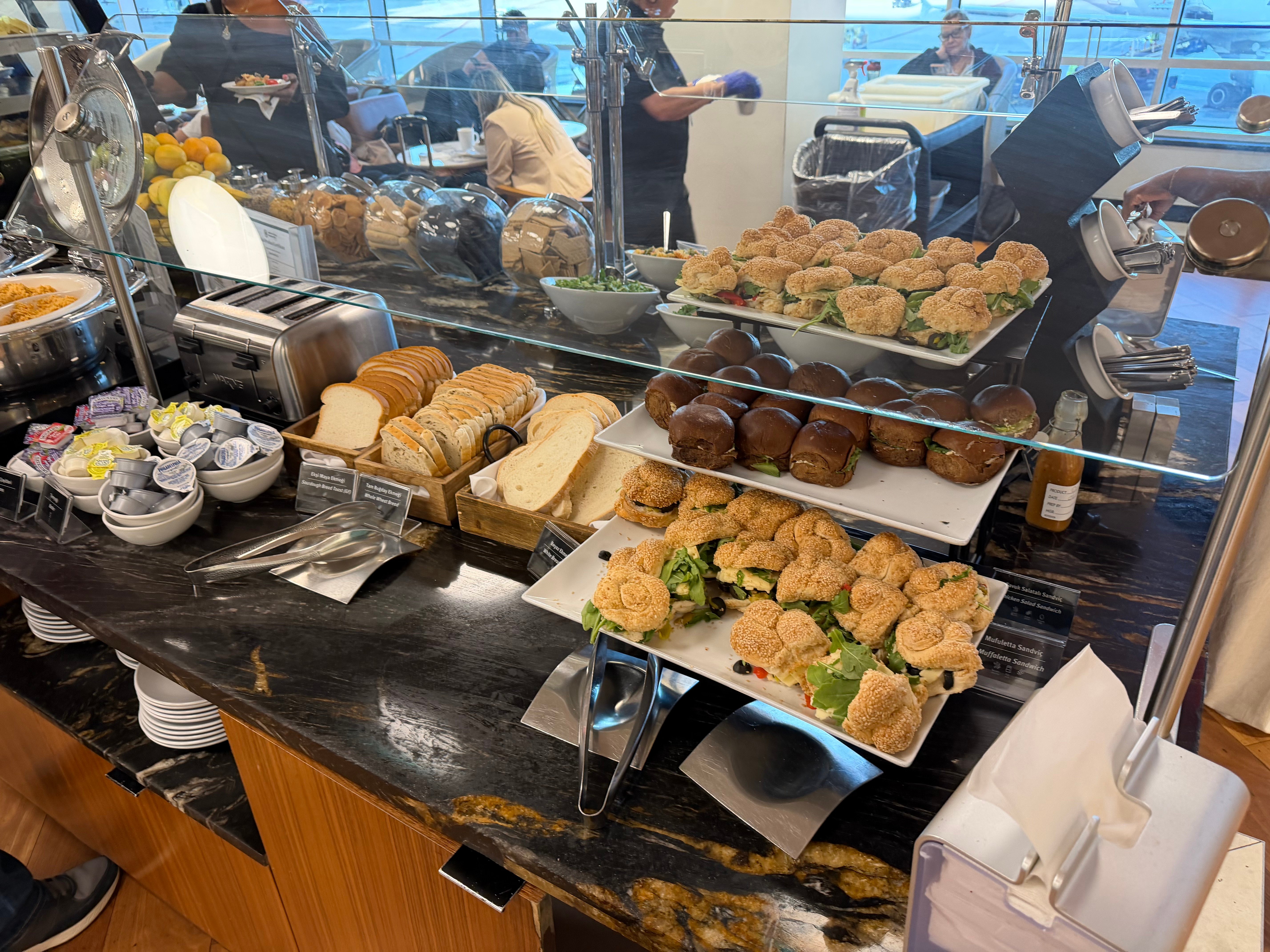Sandwiches and bread at the Turkish Airlines Lounge buffet.
