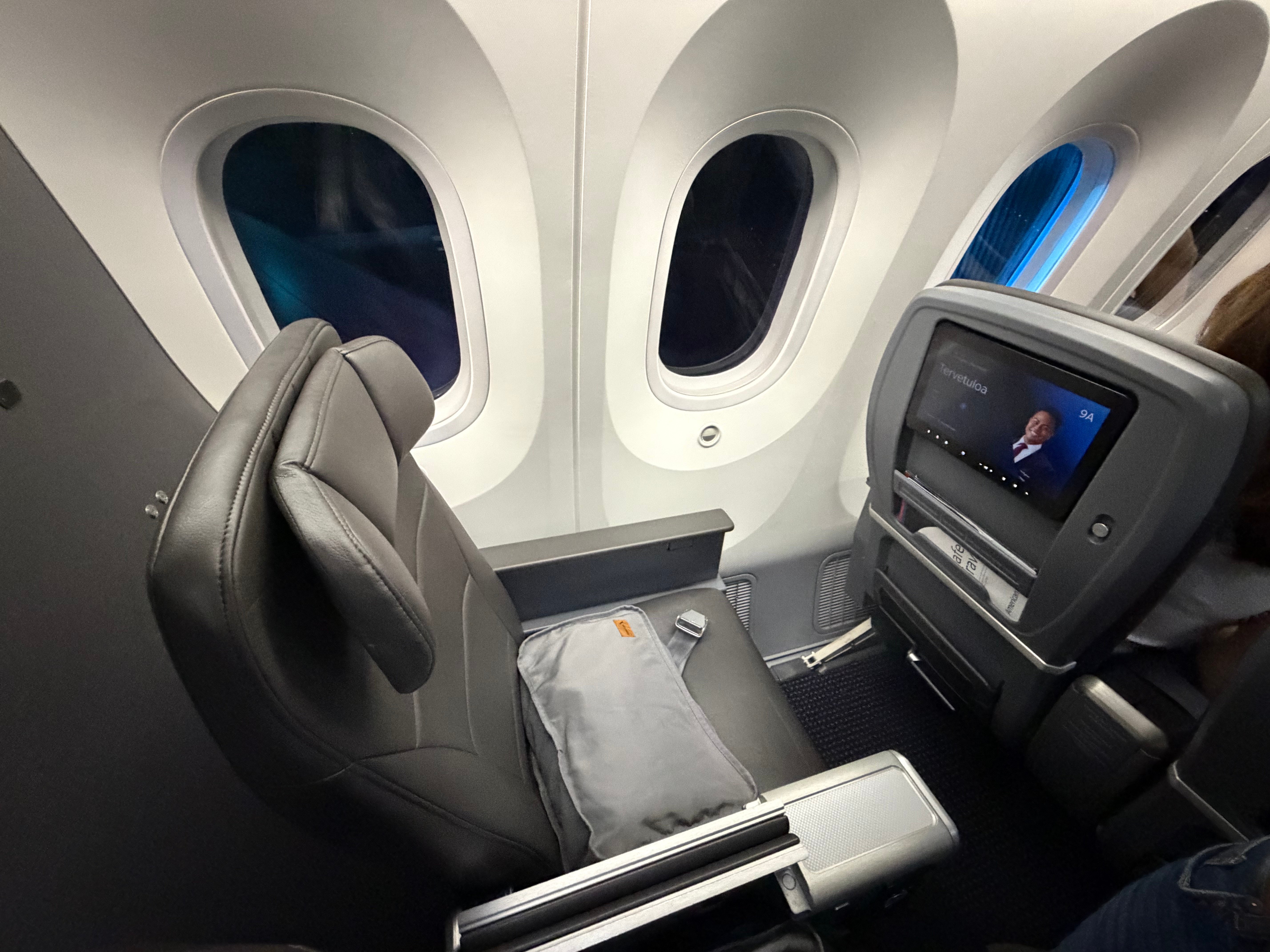 Pair of Main Cabin Extra window seats in the American 787-8 Premium Economy cabin.
