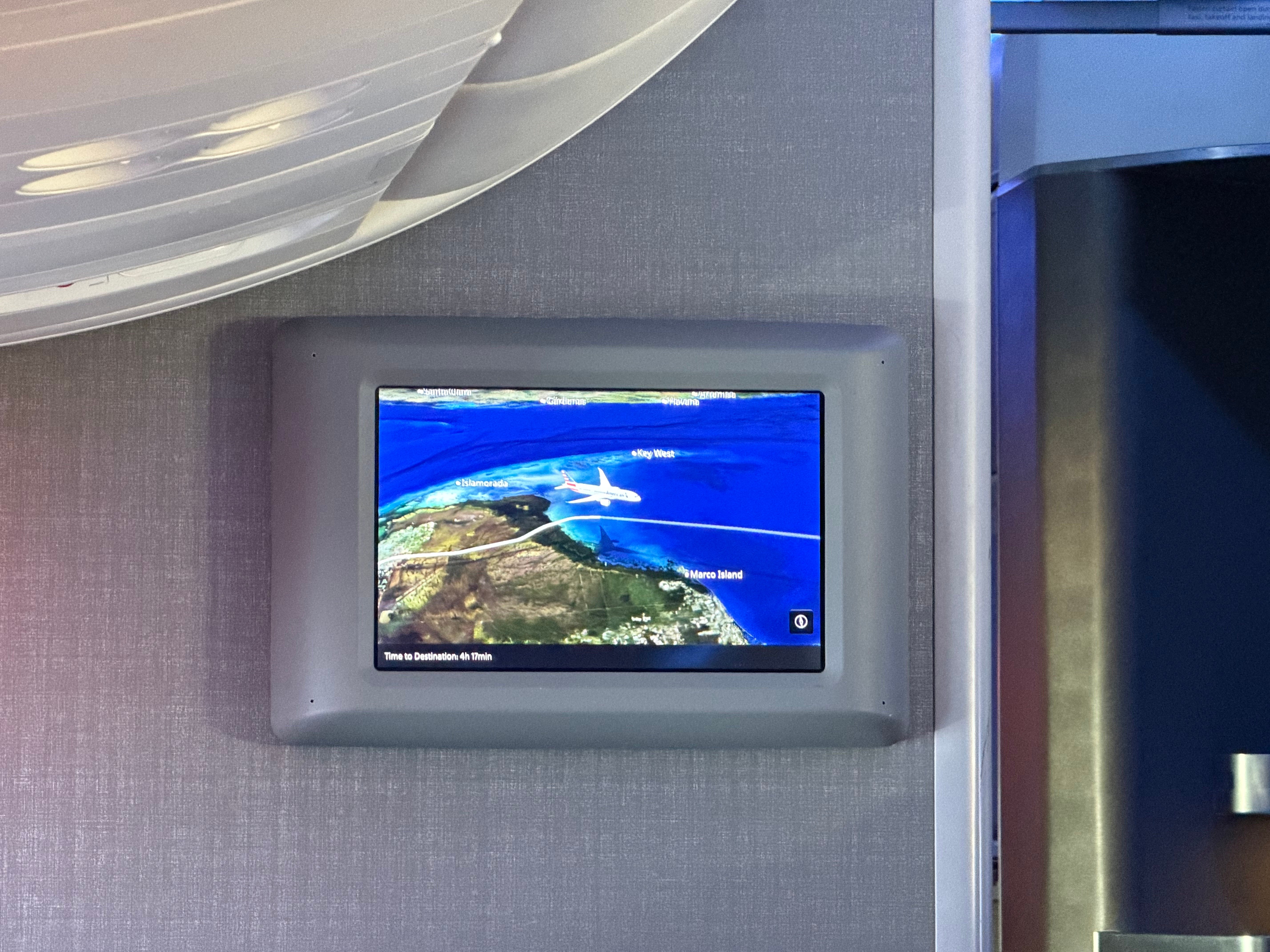 Moving map shown on the bulkhead screens in the American 787-8 cabin.