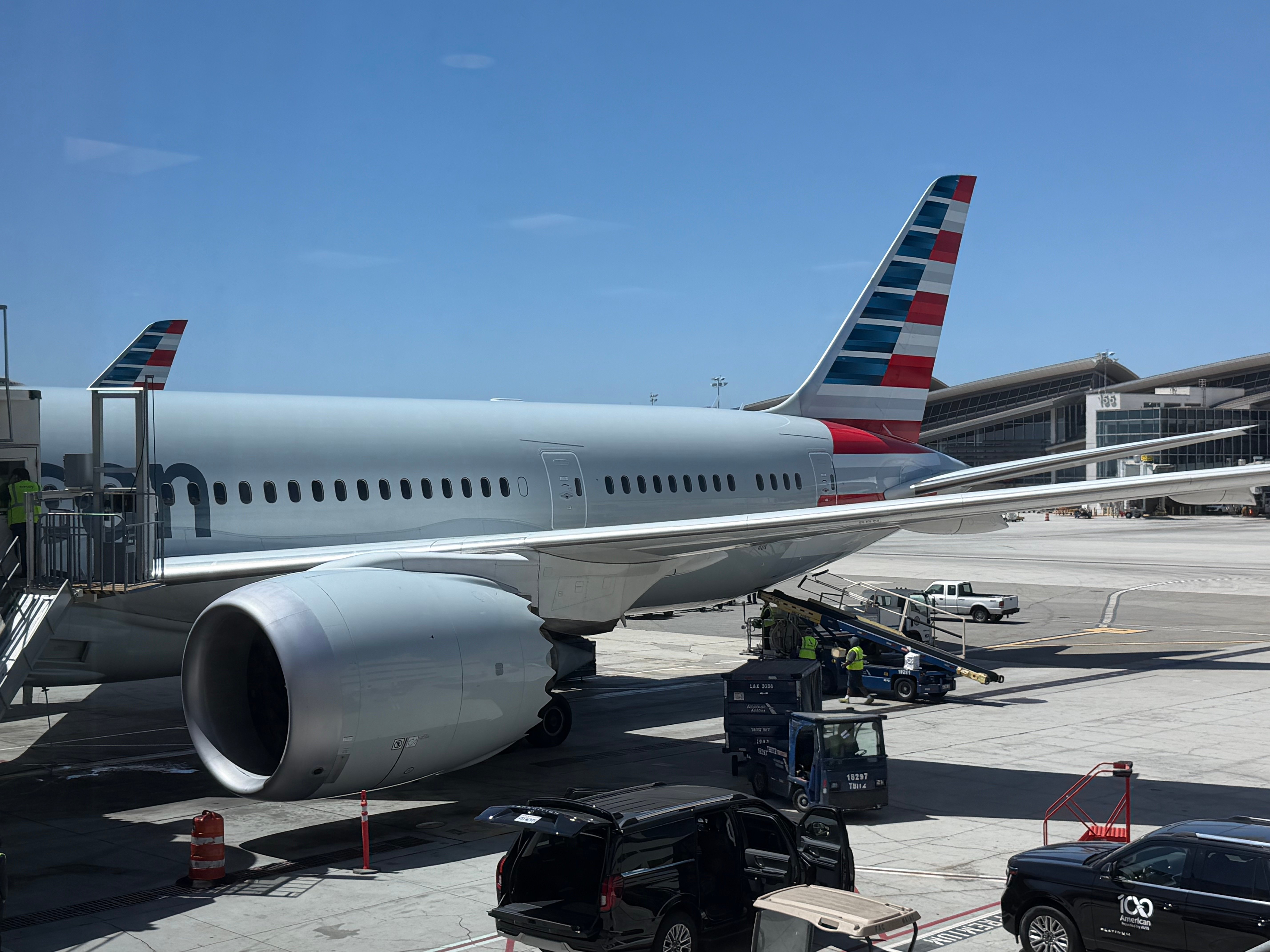 American Airlines aircraft beside the terminal after arrival at Los Angeles airport.