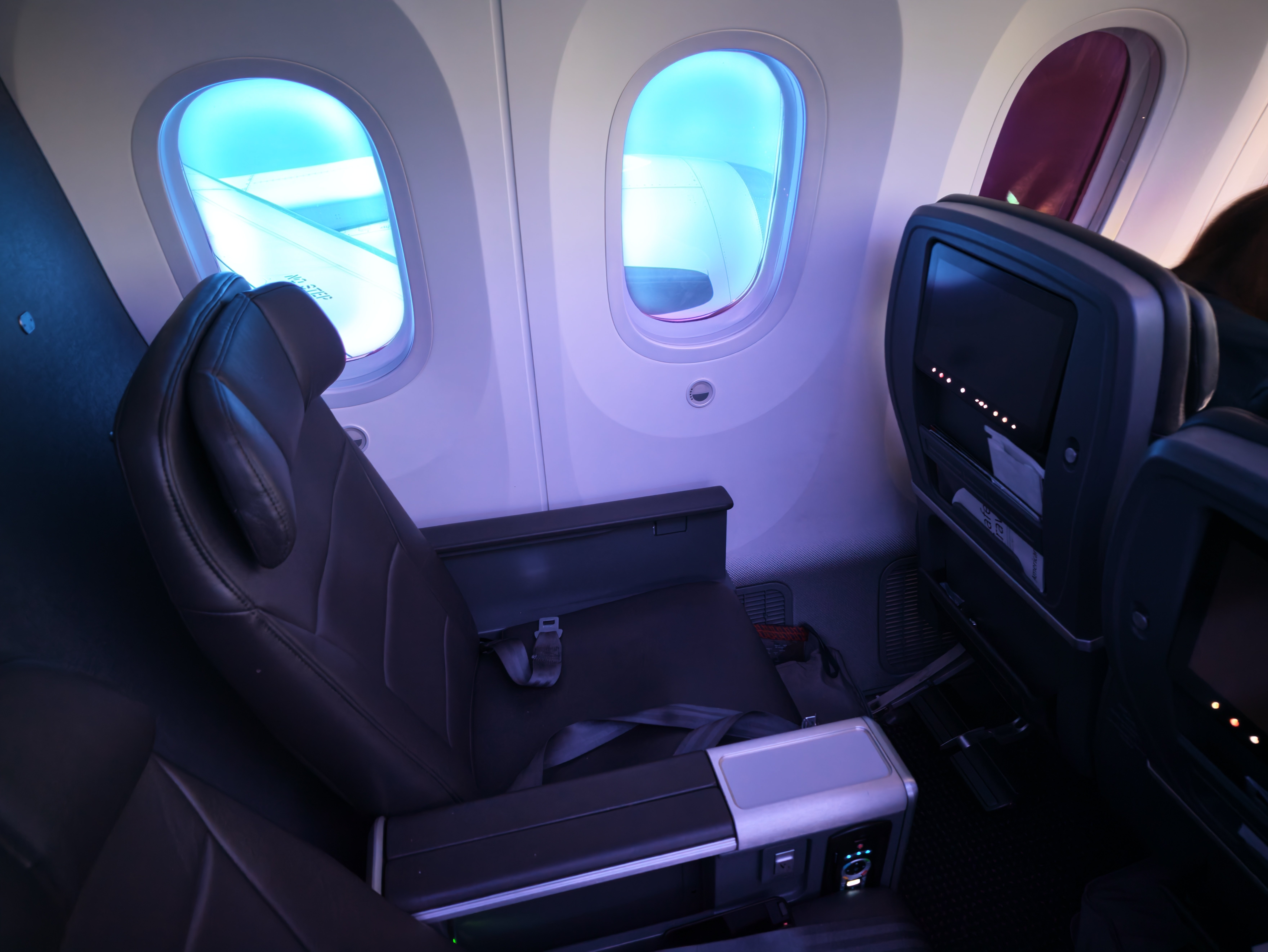 Empty pair of Main Cabin Extra window seats during the flight.