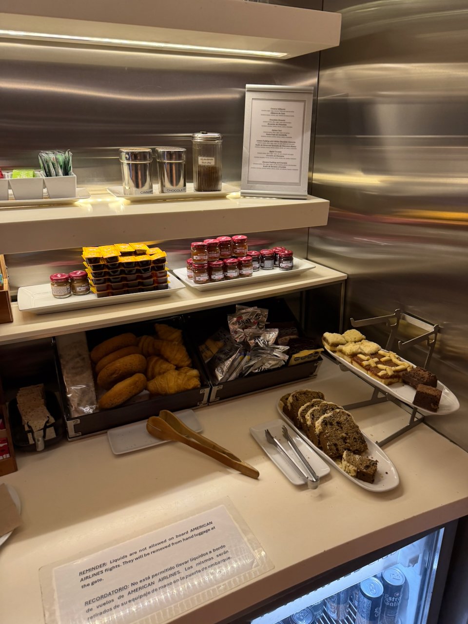 Dessert and bread selection at the AA Iberia lounge buffet in Ezeiza.