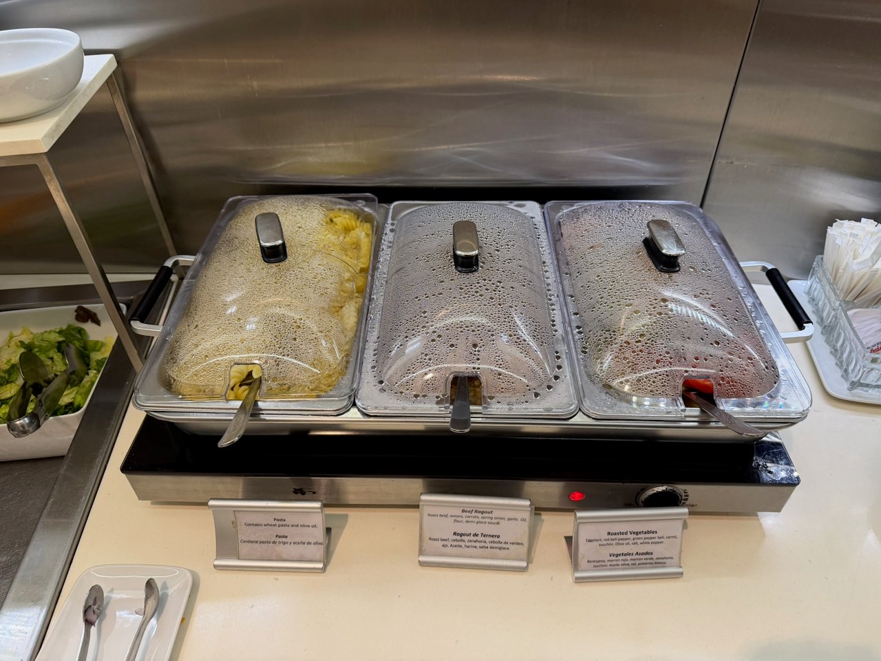 Hot food options at the AA Iberia lounge buffet in Buenos Aires.