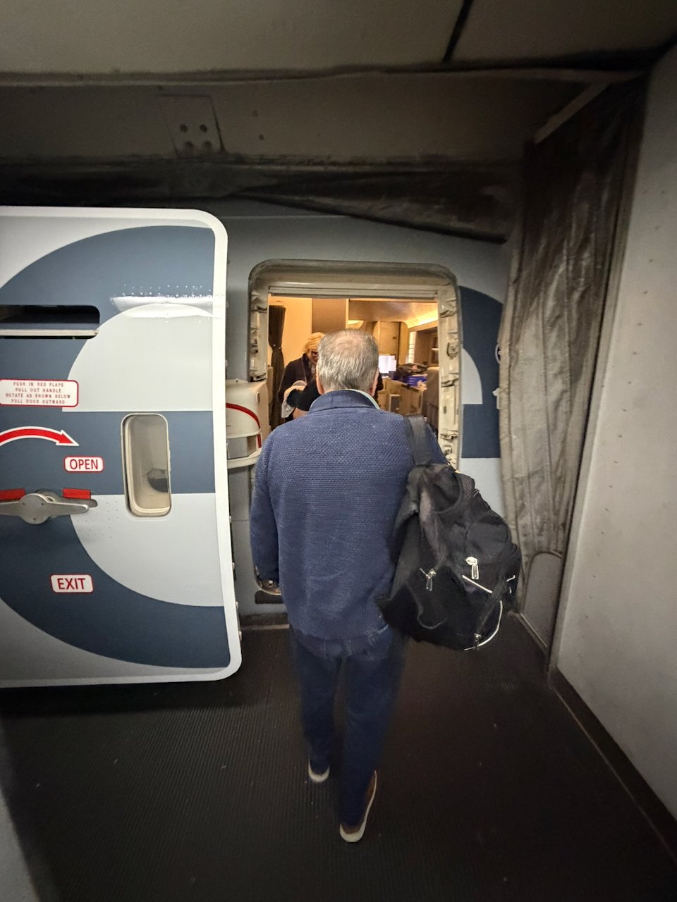 Boarding door from the jet bridge onto the American Airlines 777-300ER.