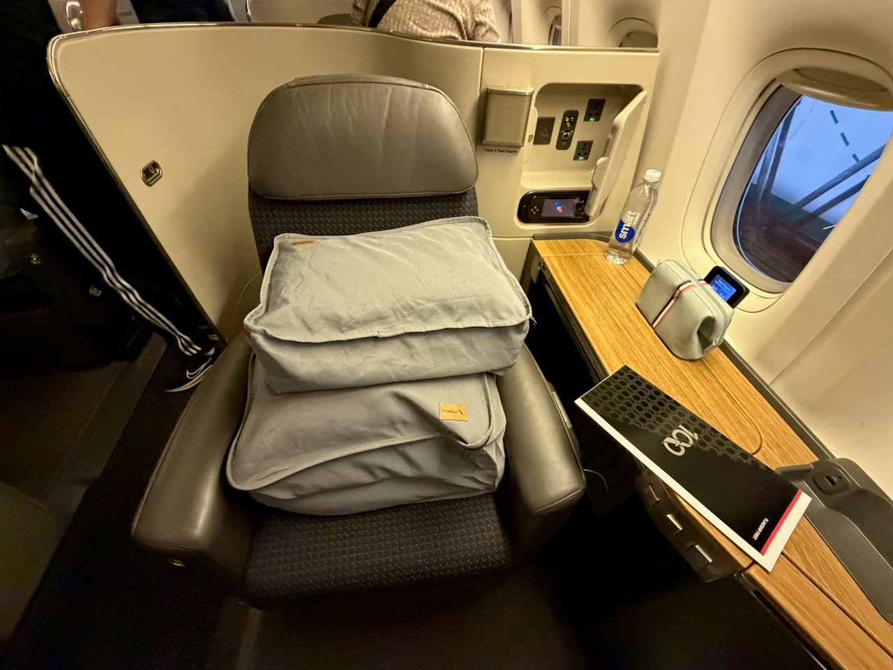 Flagship First seat with the American centennial menu placed at the seat.