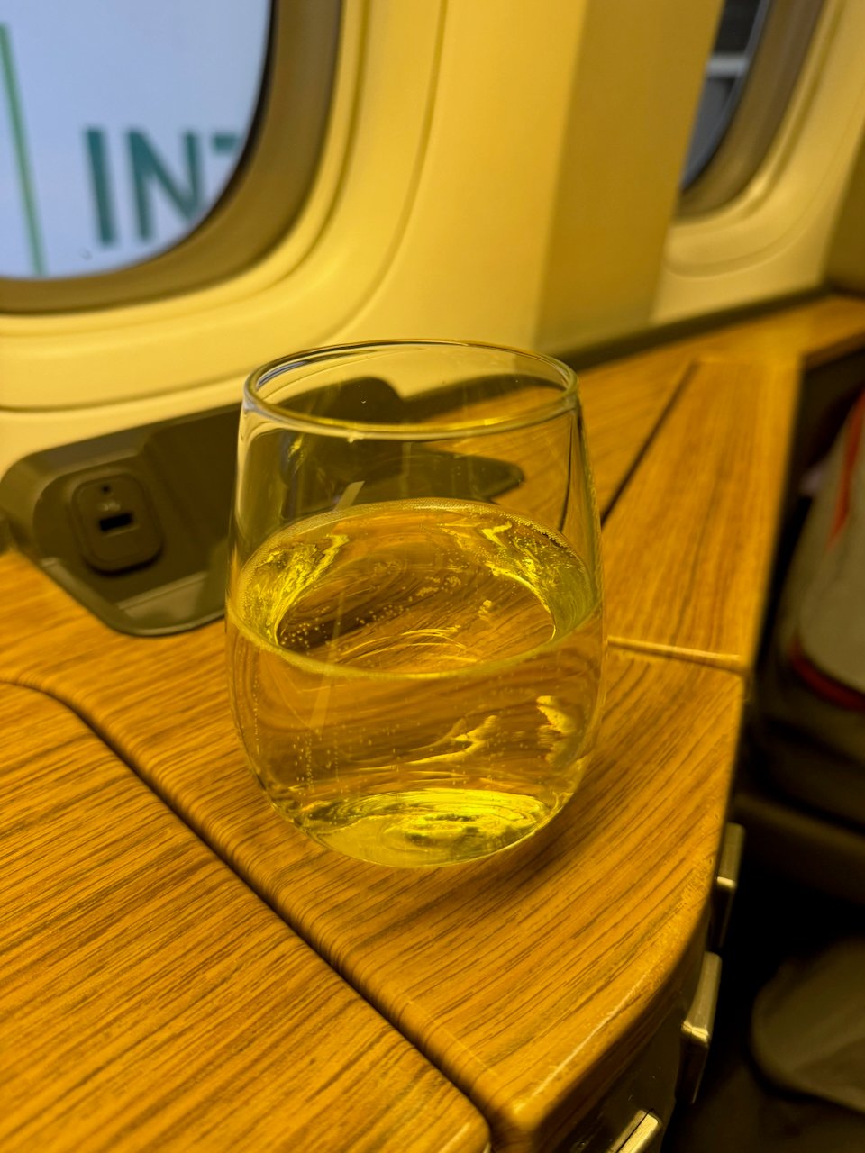 Welcome glass of Bollinger champagne at the American Flagship First seat.