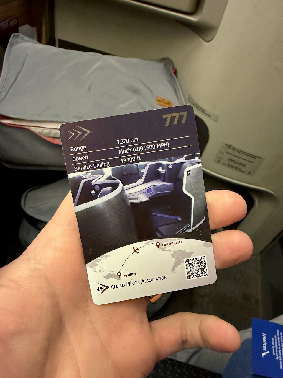Back of the American 777 pilot trading card.