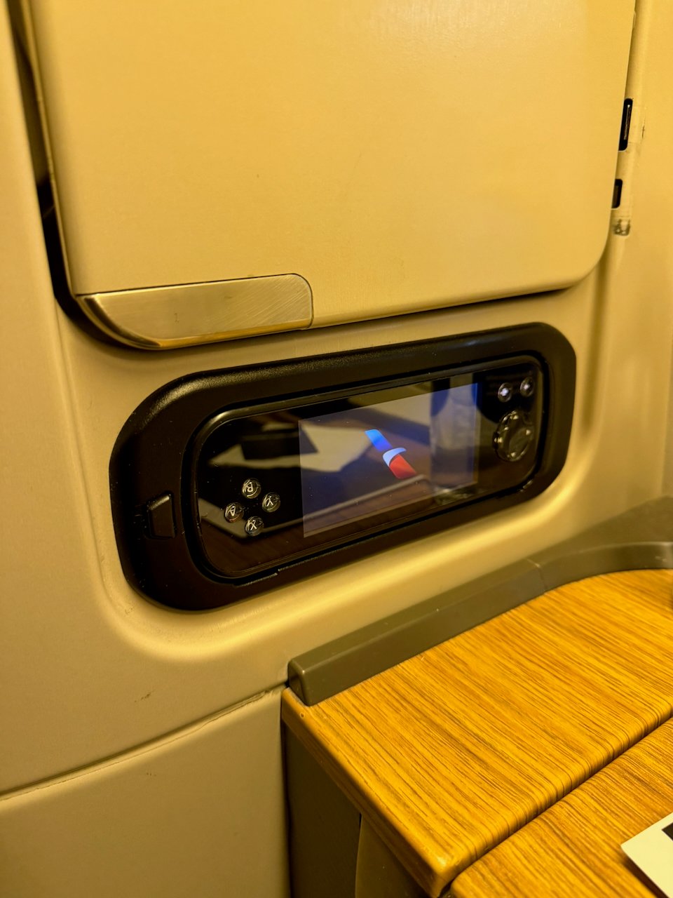 Physical seat control panel in the American 777 Flagship First suite.