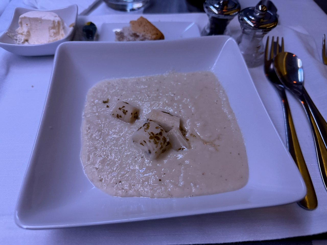 Heart of palm soup course in American Airlines Flagship First.