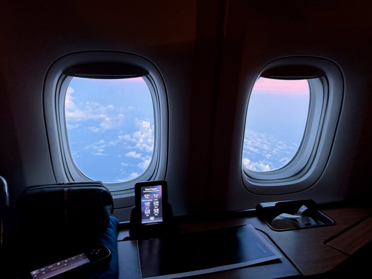 Sunrise window view approaching New York on the American 777.