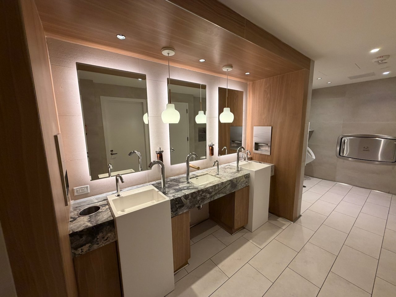 Restroom sinks at the JFK Chelsea Lounge.