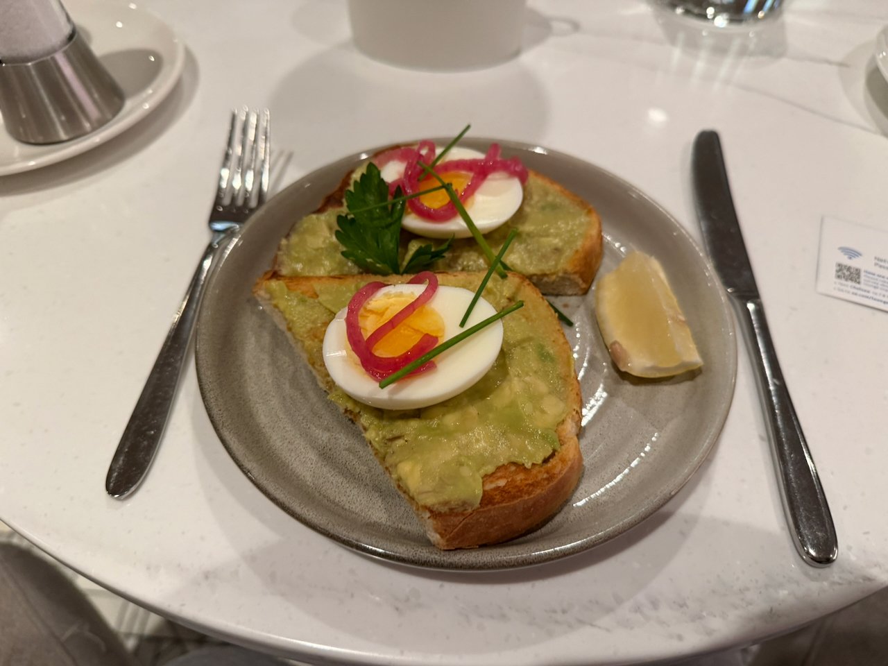 Avocado toast with egg at the JFK Chelsea Lounge.