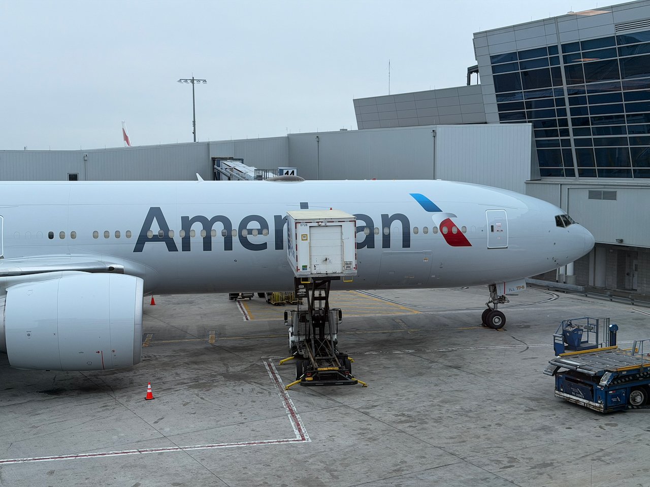Close-up of the American 777-300ER nose at JFK after arrival.