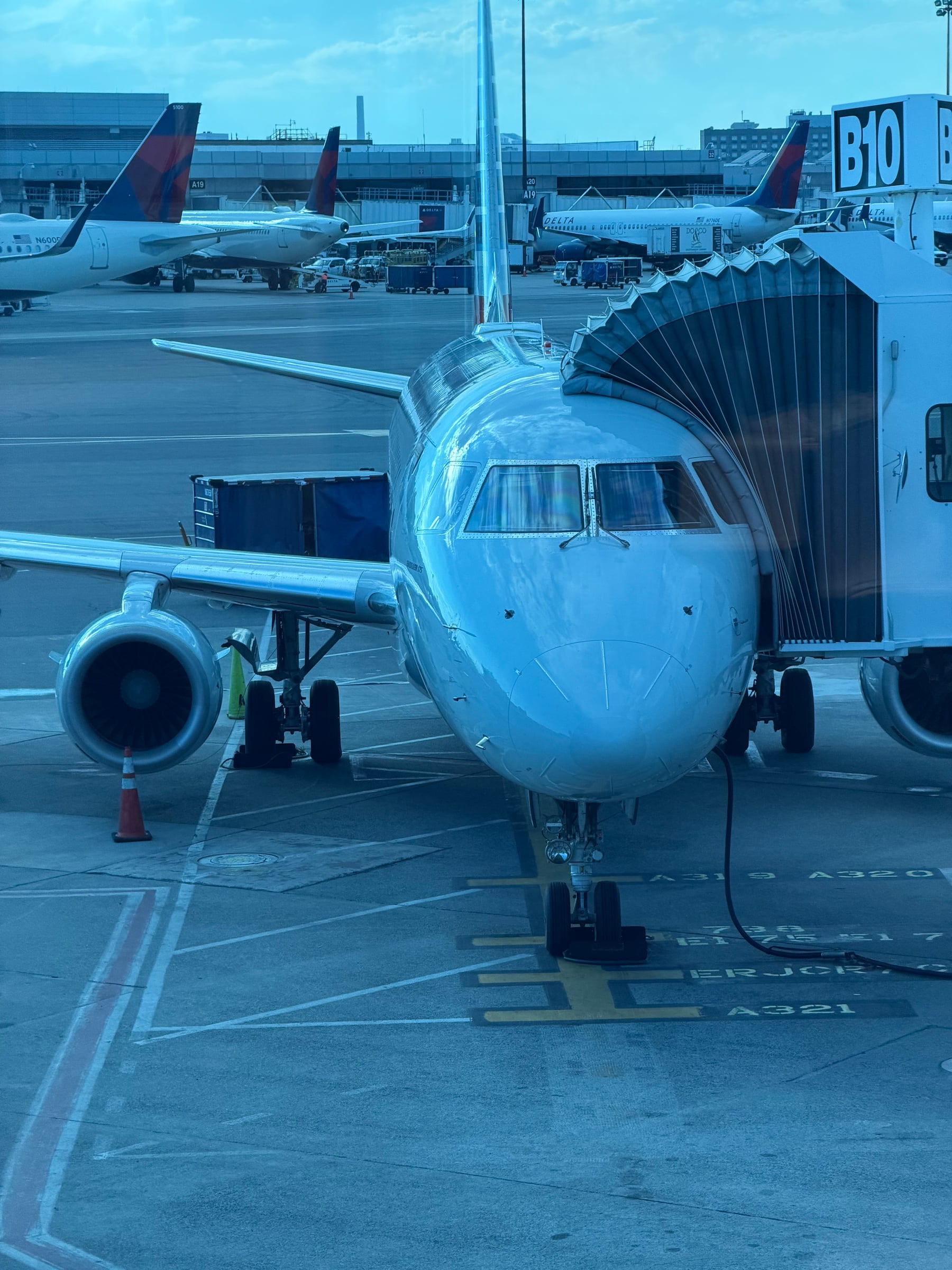 American Eagle Embraer 175 at gate B10 in Boston for the positioning flight to JFK.