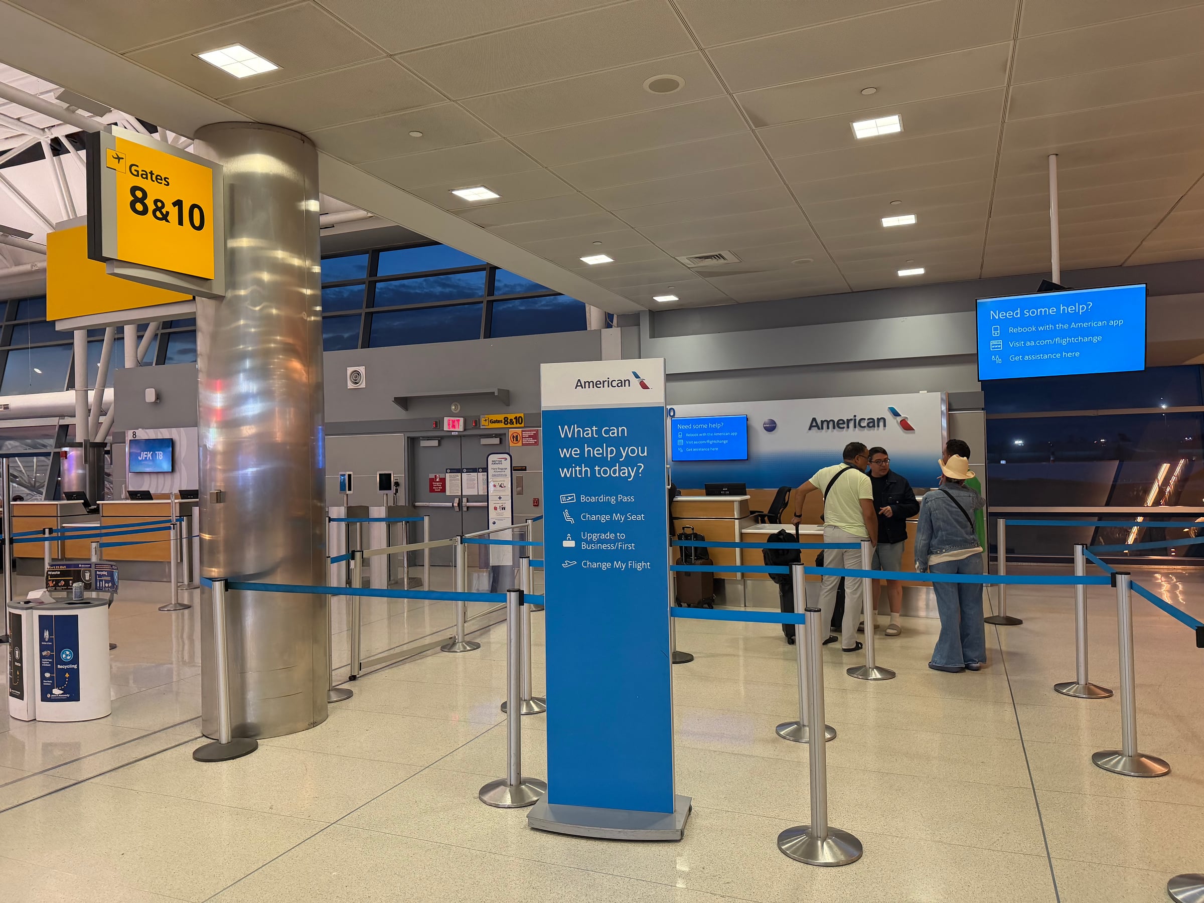American Airlines customer service desk near gates 8 and 10 at JFK Terminal 8.