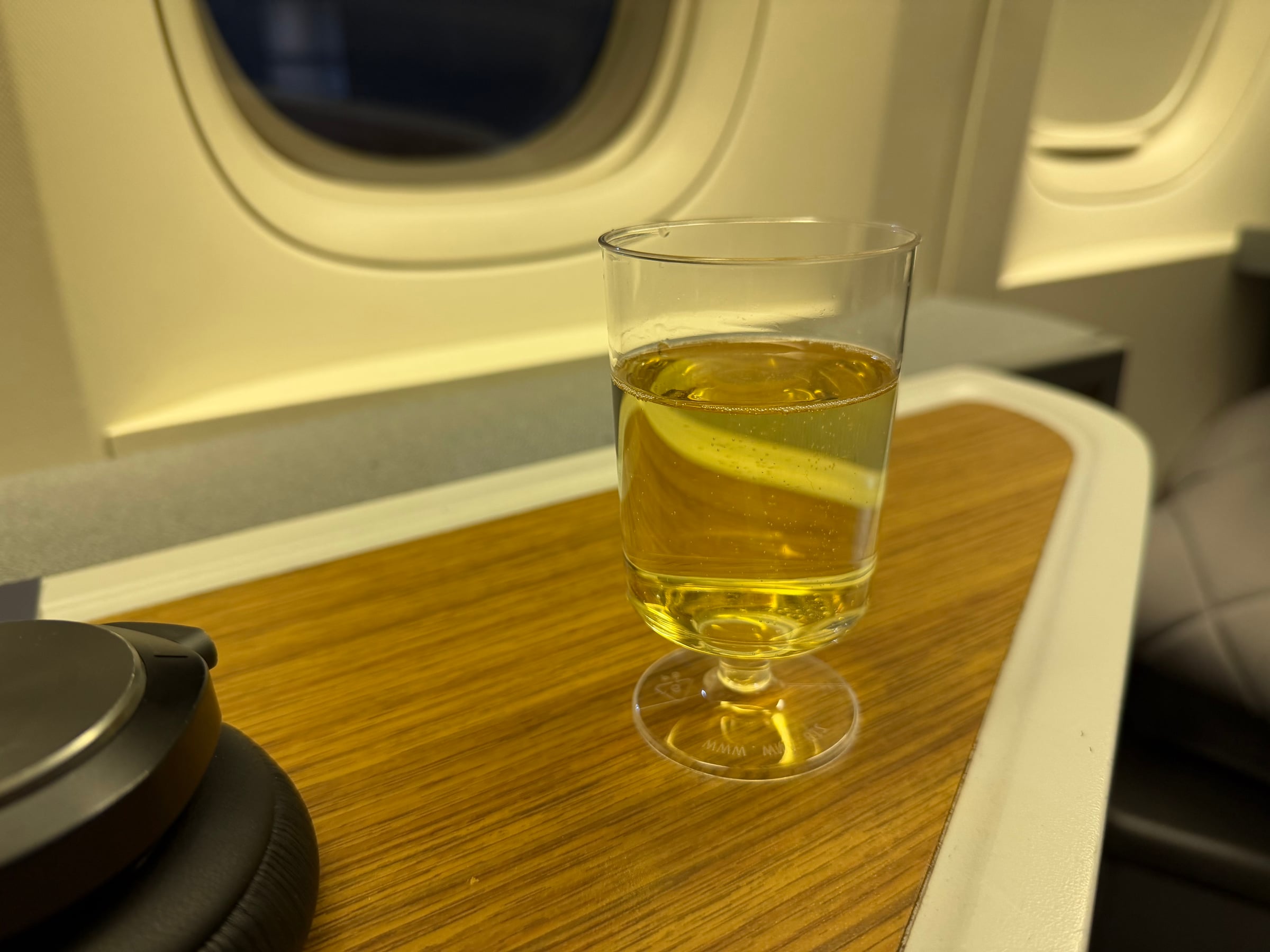 Welcome glass of champagne at the American Airlines Flagship Business seat.