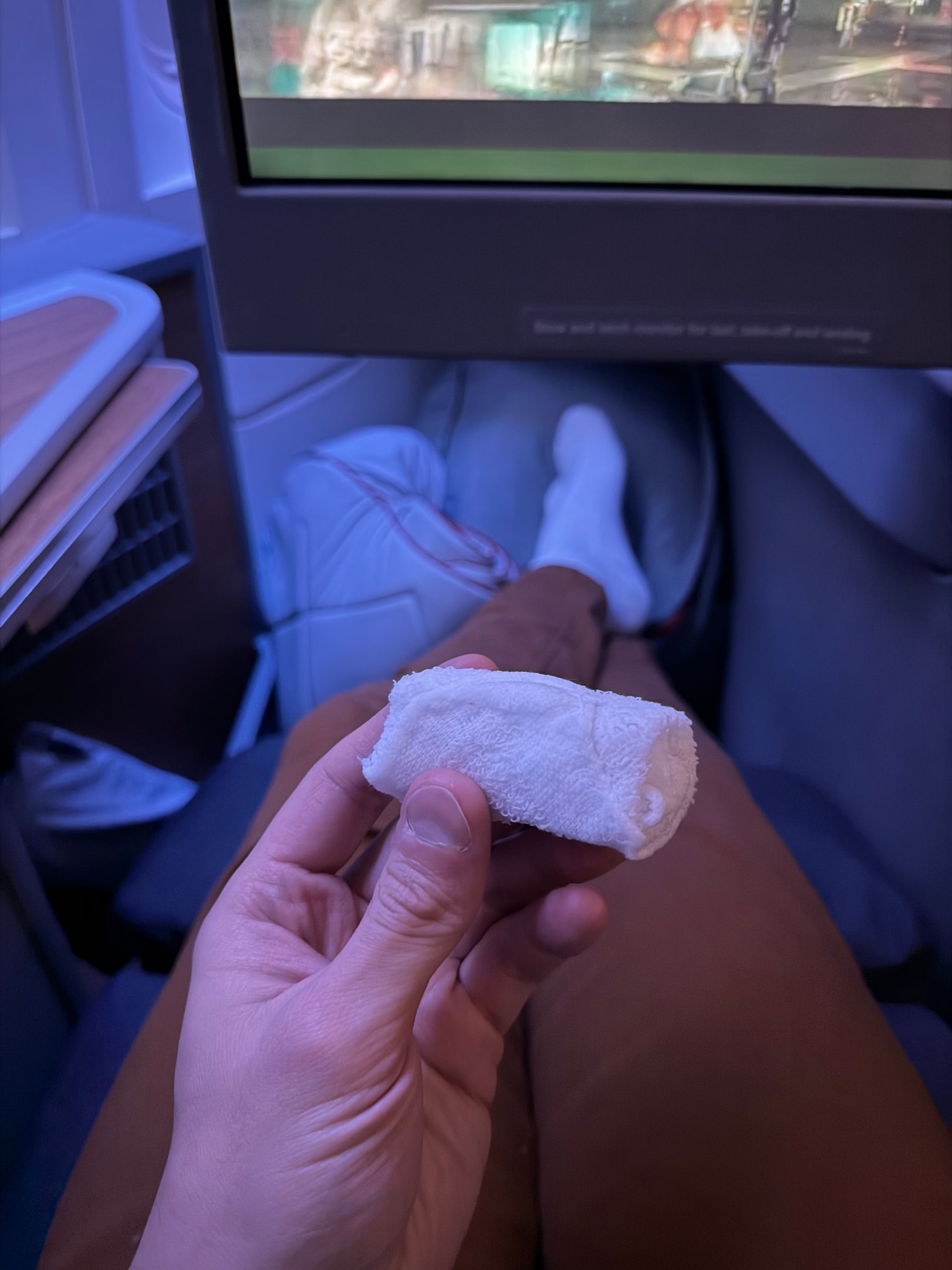 Hot towel service before dinner in American Airlines Flagship Business.