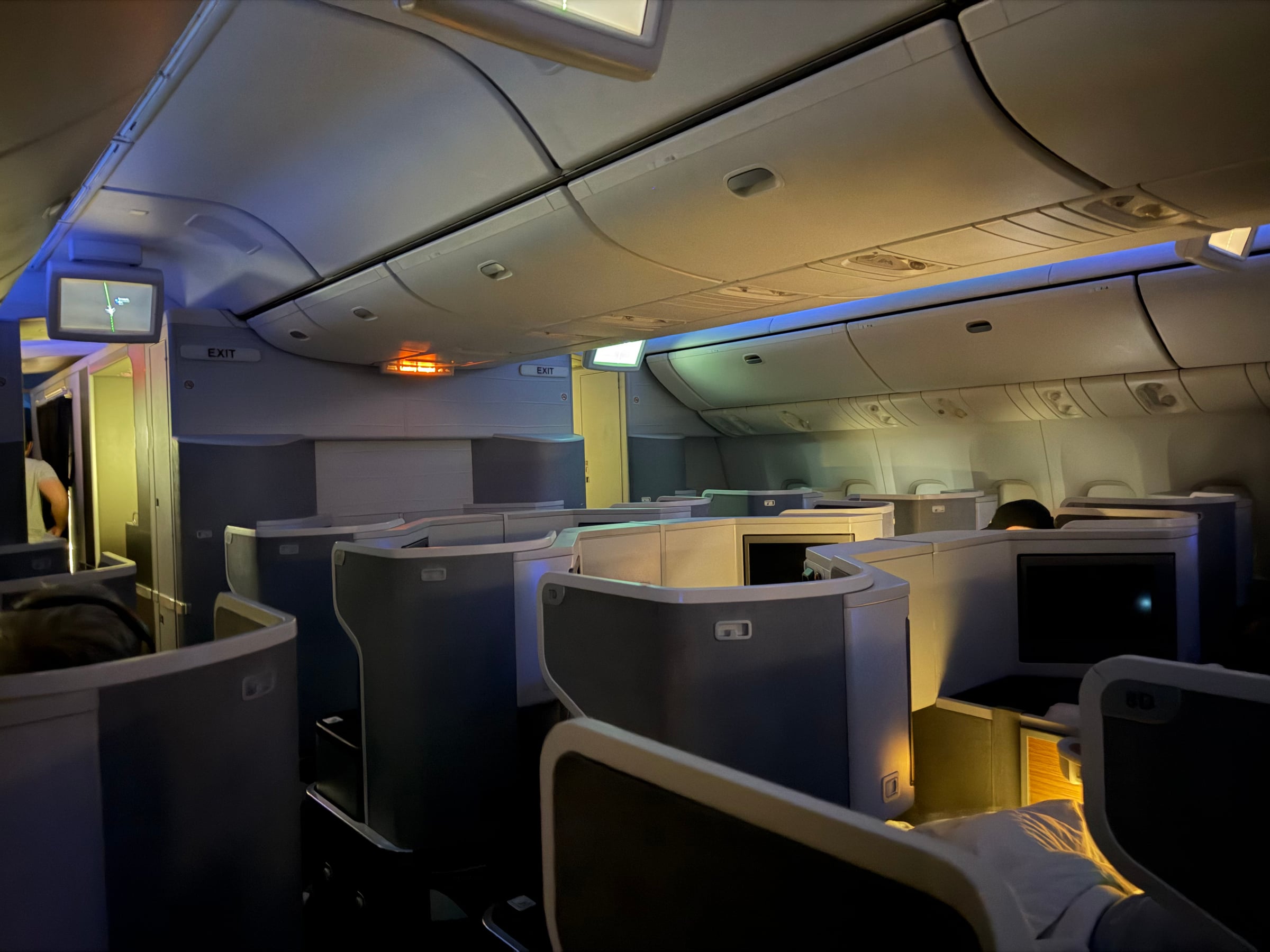 Dark American Airlines Flagship Business cabin during the overnight flight.