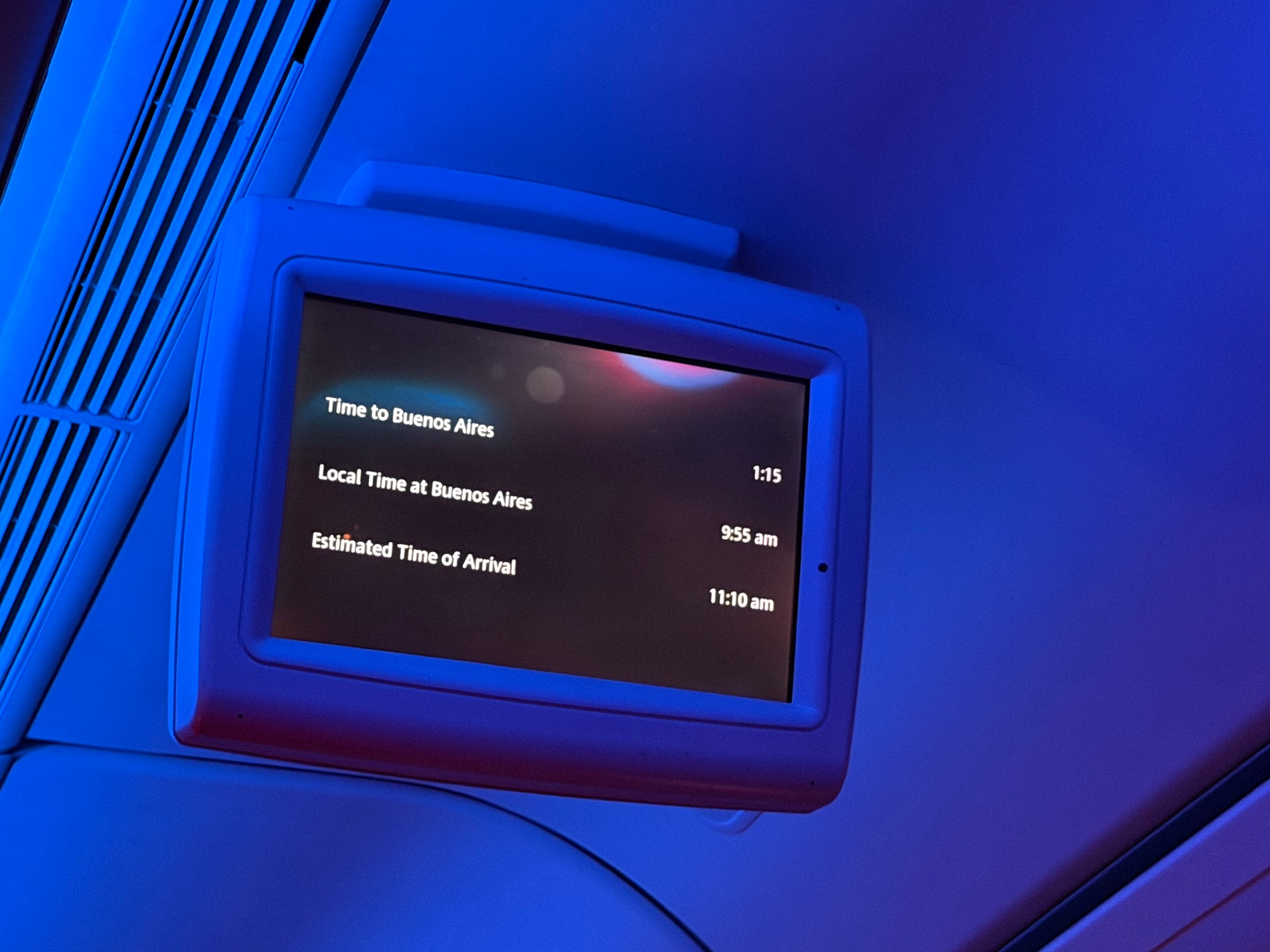 IFE flight information showing one hour and 35 minutes remaining to Buenos Aires.
