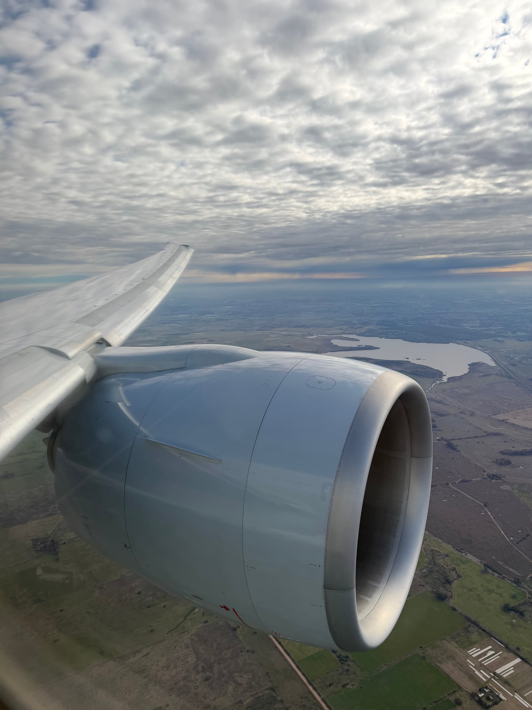American 777 engine and wing view while descending toward Buenos Aires.
