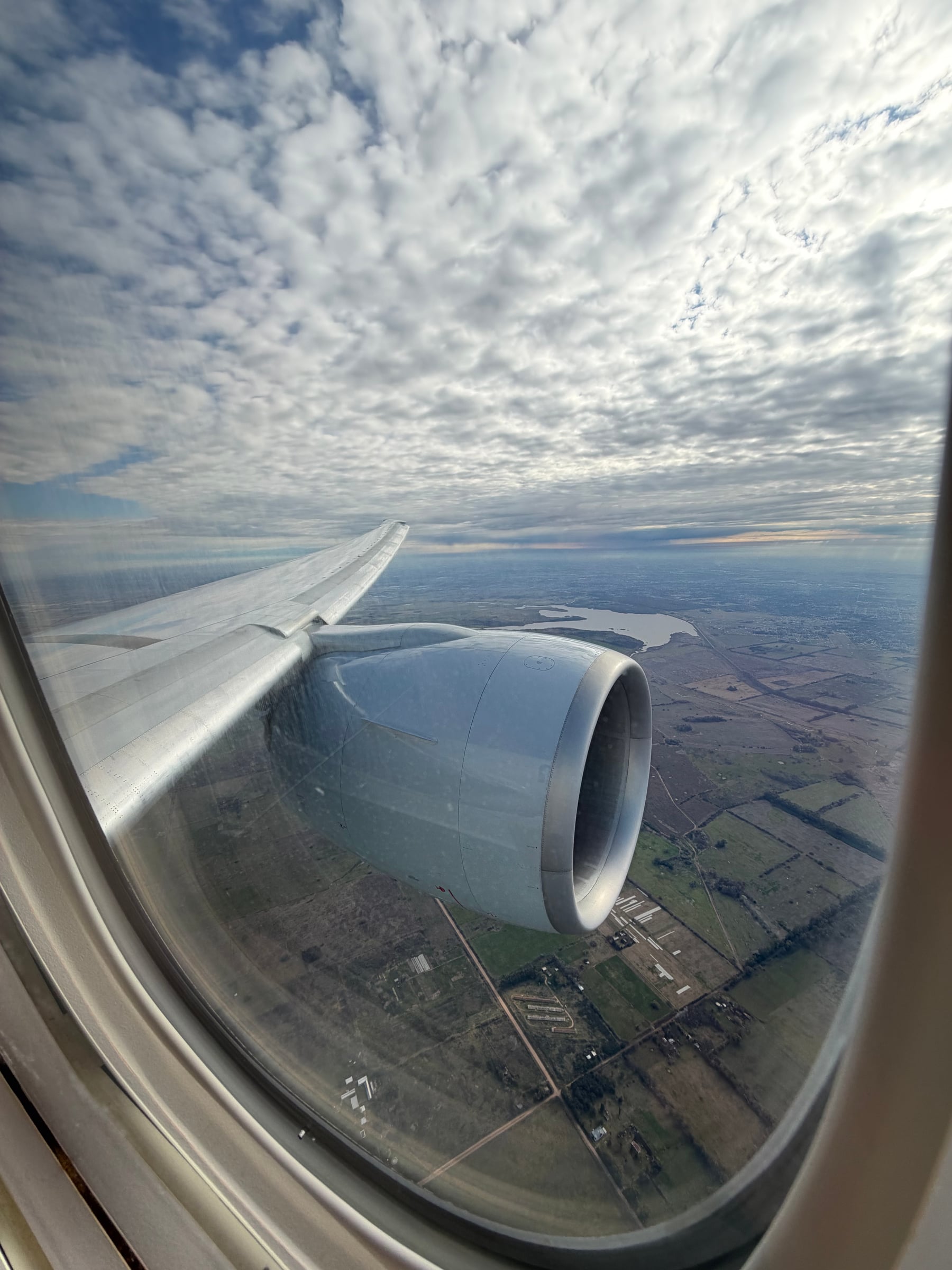 Wing and engine view during the approach to Buenos Aires Ezeiza Airport.