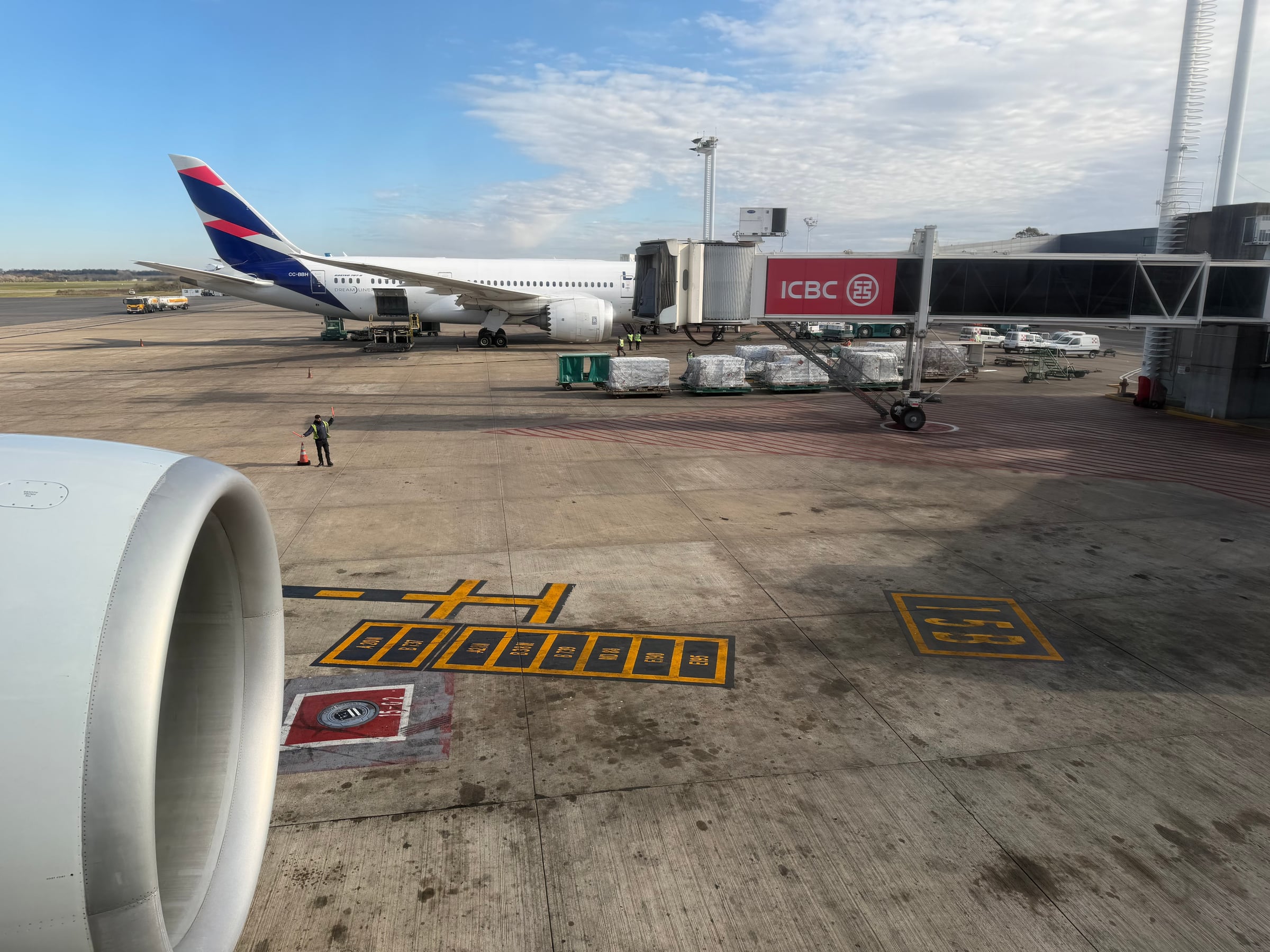 LATAM aircraft at a neighboring gate after arrival at Buenos Aires Ezeiza.