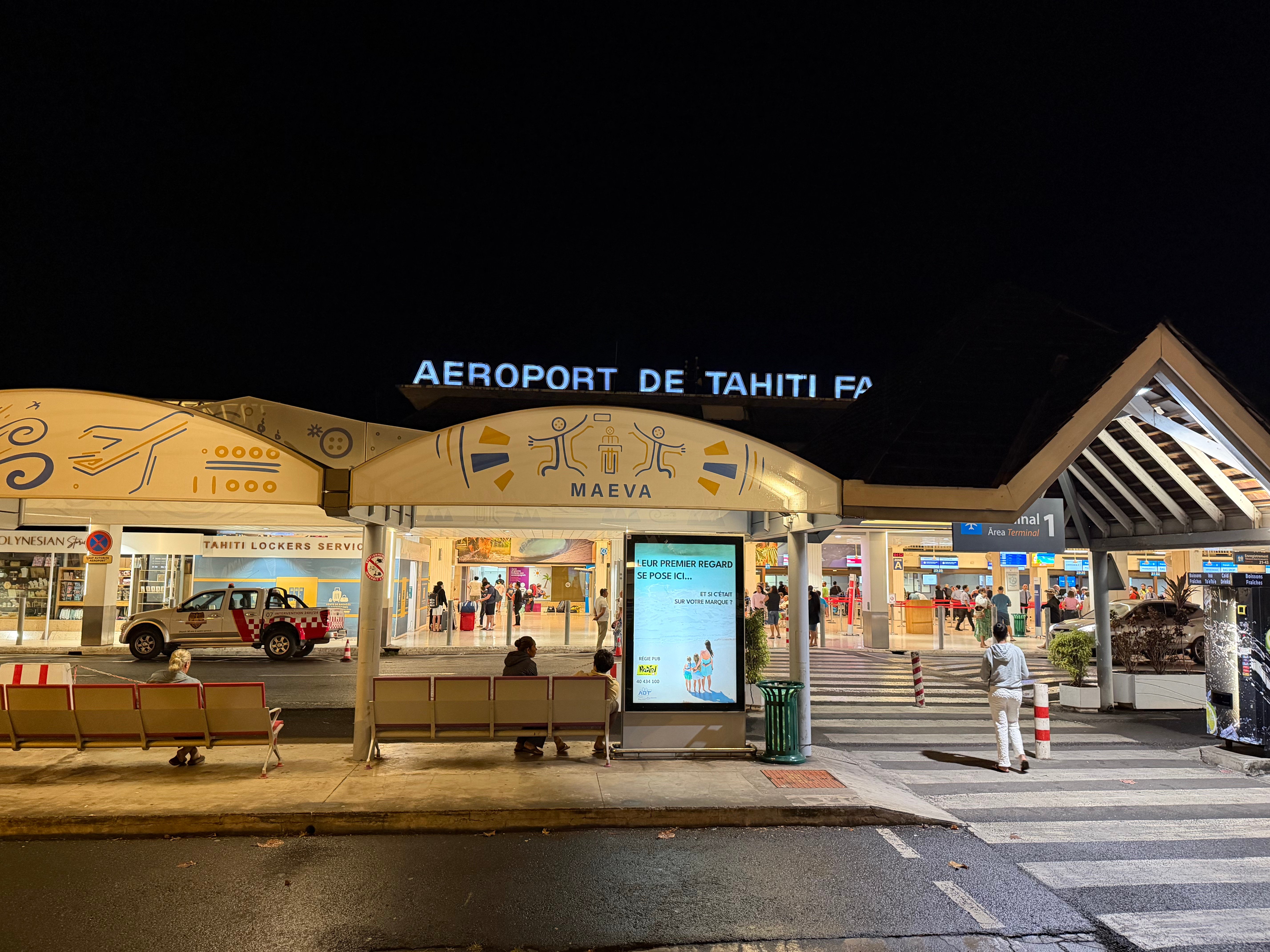 Entrance to the Papeete airport terminal before dawn.