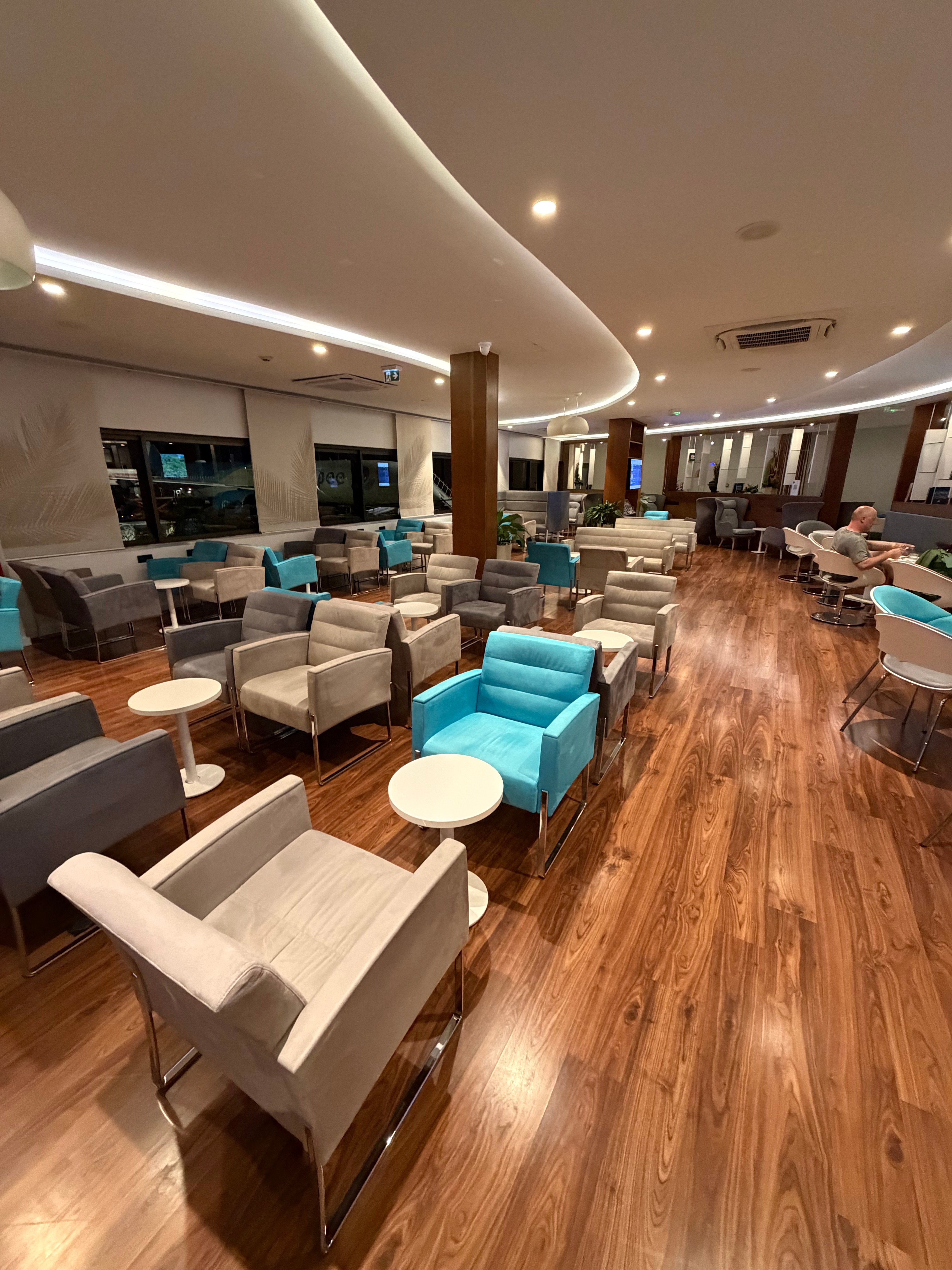 Lounge seats beside the terminal windows.