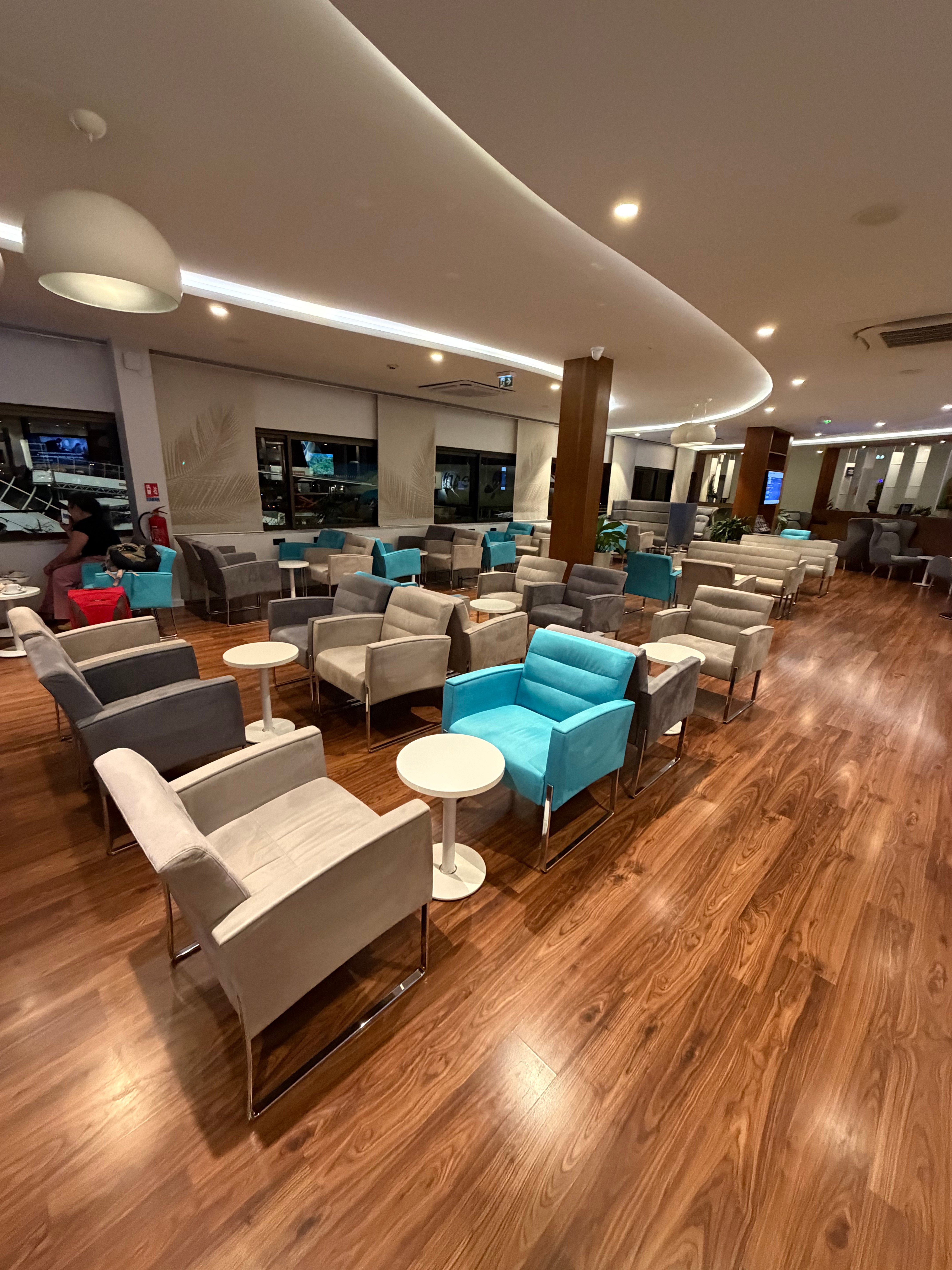Armchairs arranged near the lounge windows.