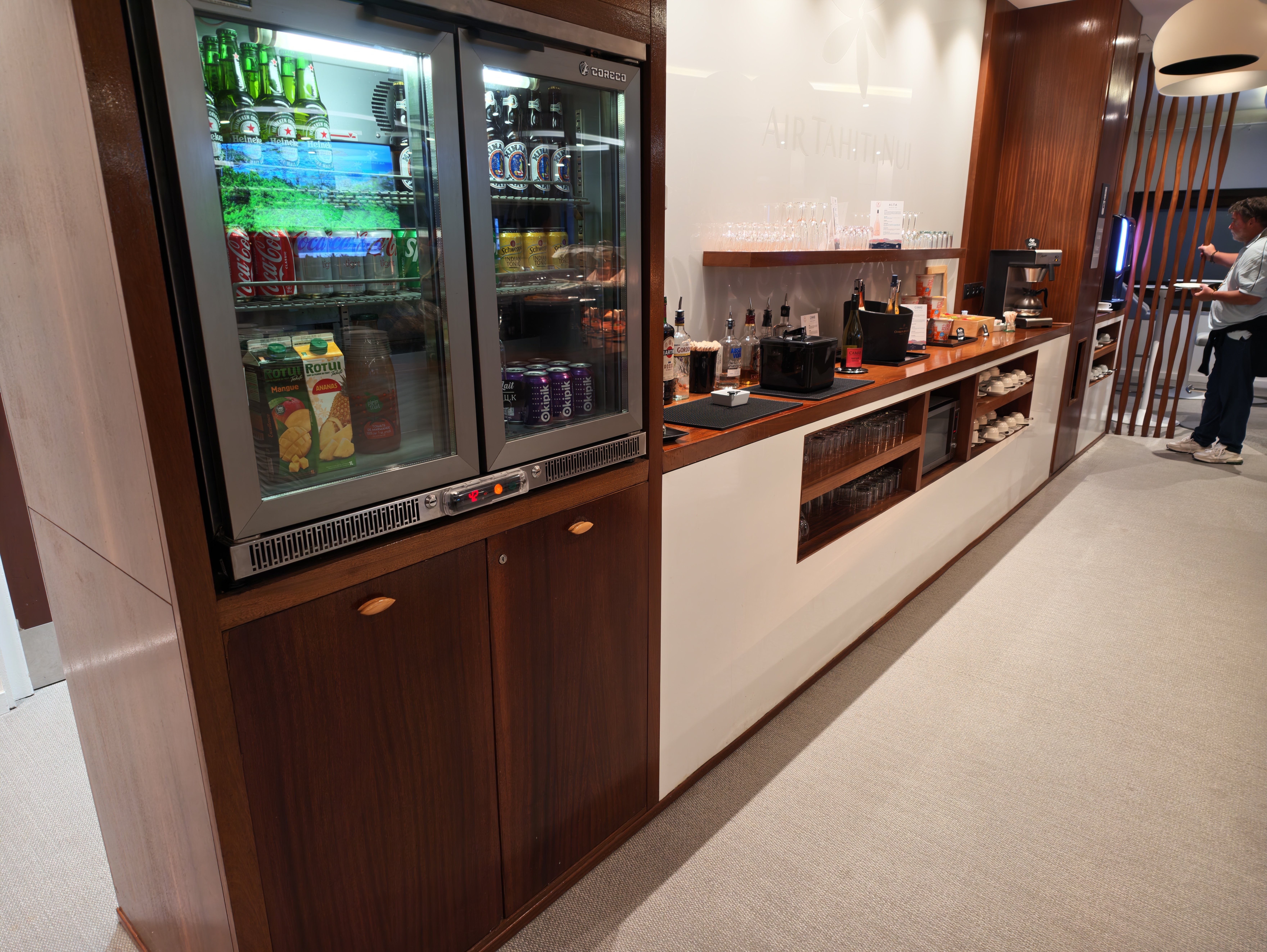 Refrigerators stocked with drinks at the lounge.
