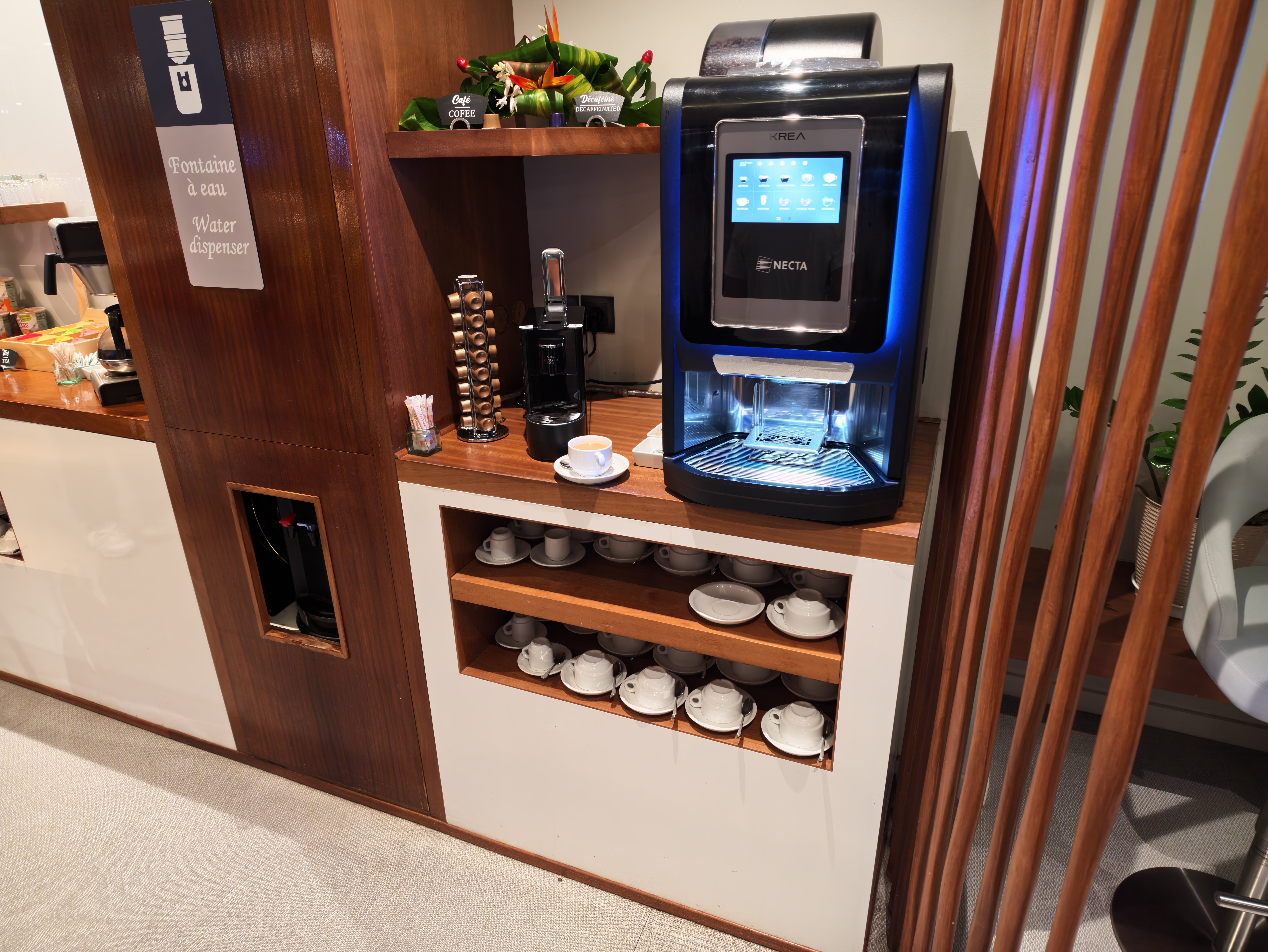 Coffee and hot drink station inside the lounge.