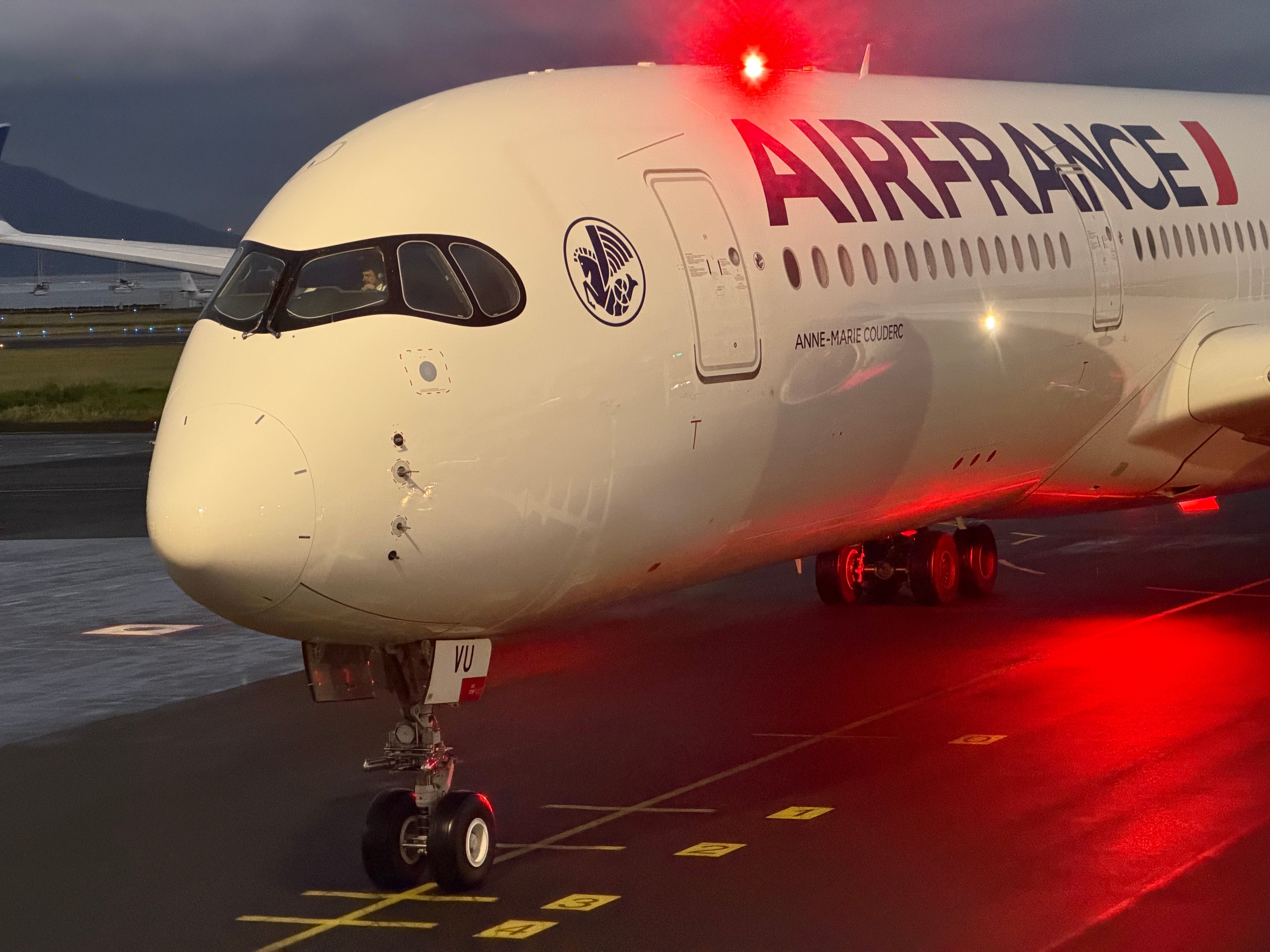Air France A350 nose with Anne-Marie Couderc painted on the fuselage.