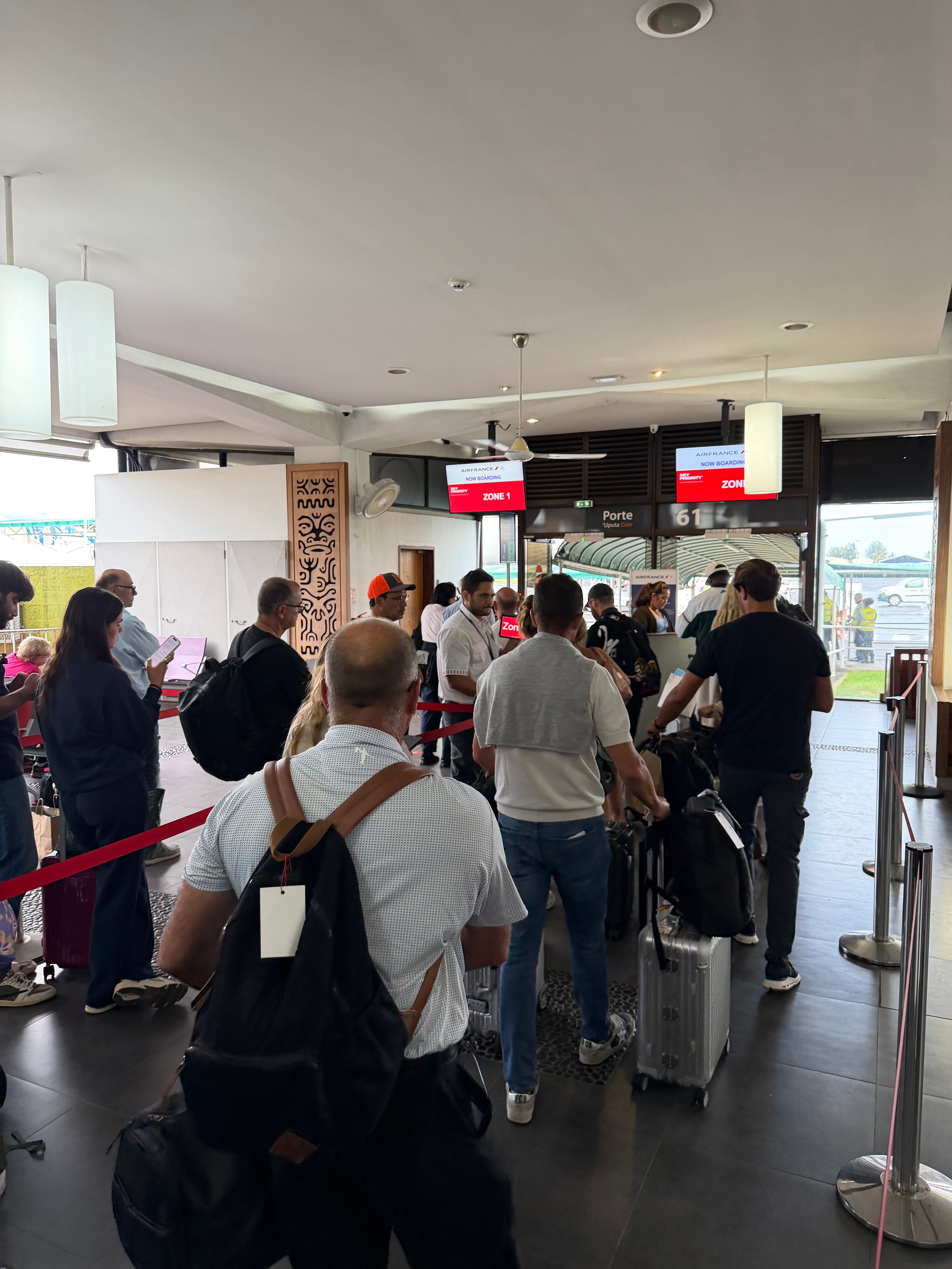 Passengers waiting to board the Air France flight in Papeete.
