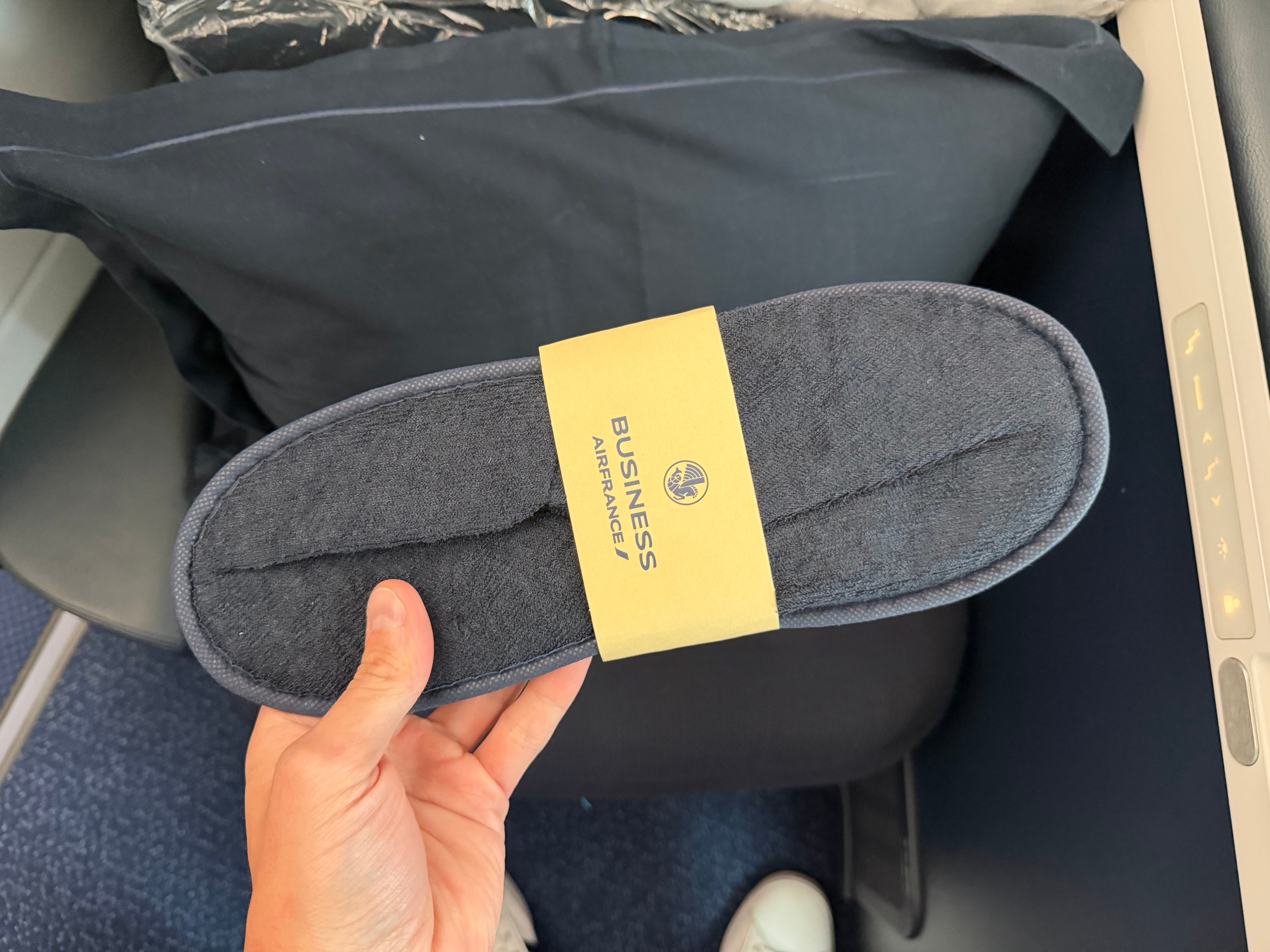 Air France Business Class slippers at the seat.
