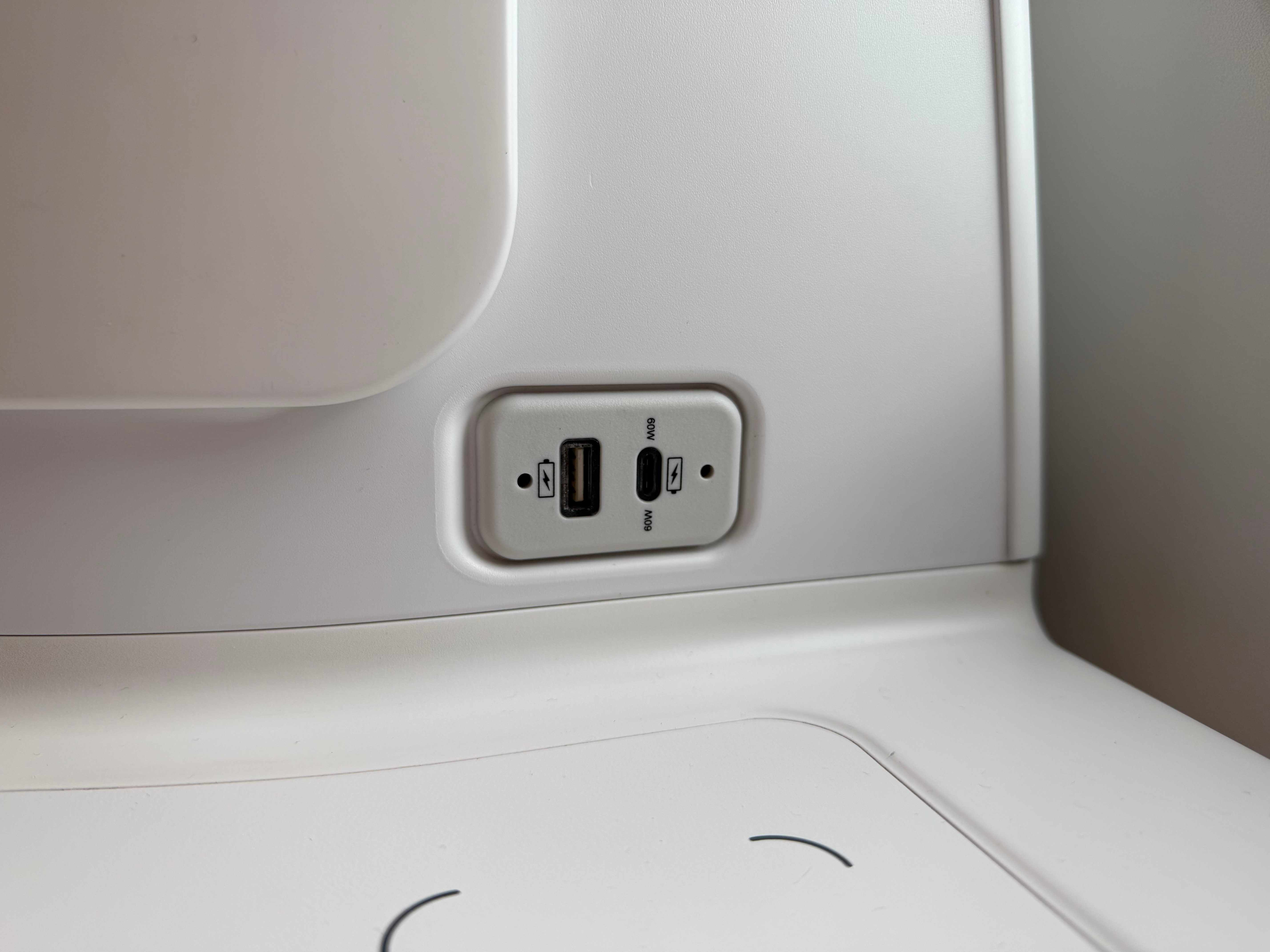 USB A and USB C charging ports at the seat.
