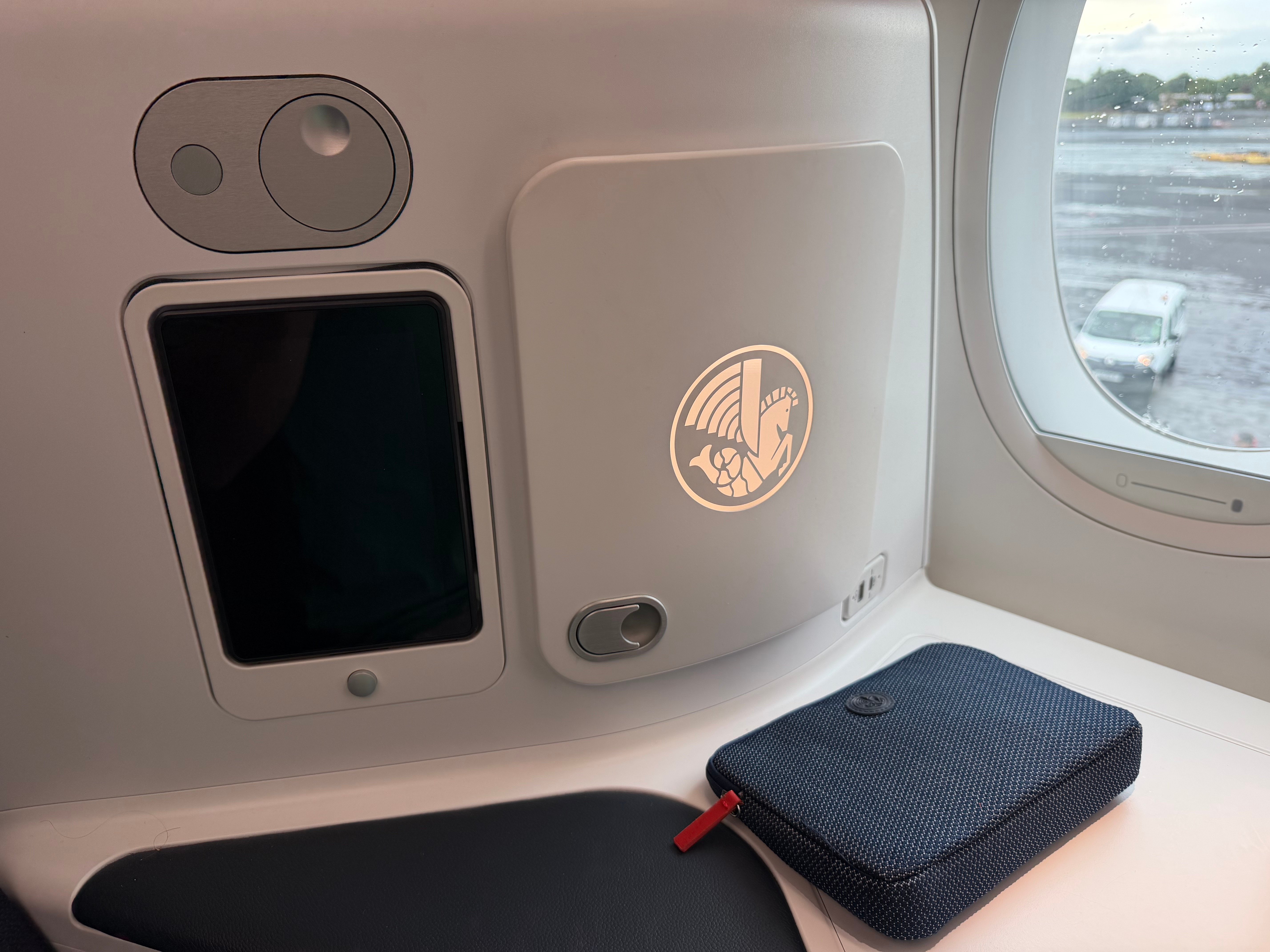Air France amenity kit resting at the seat.