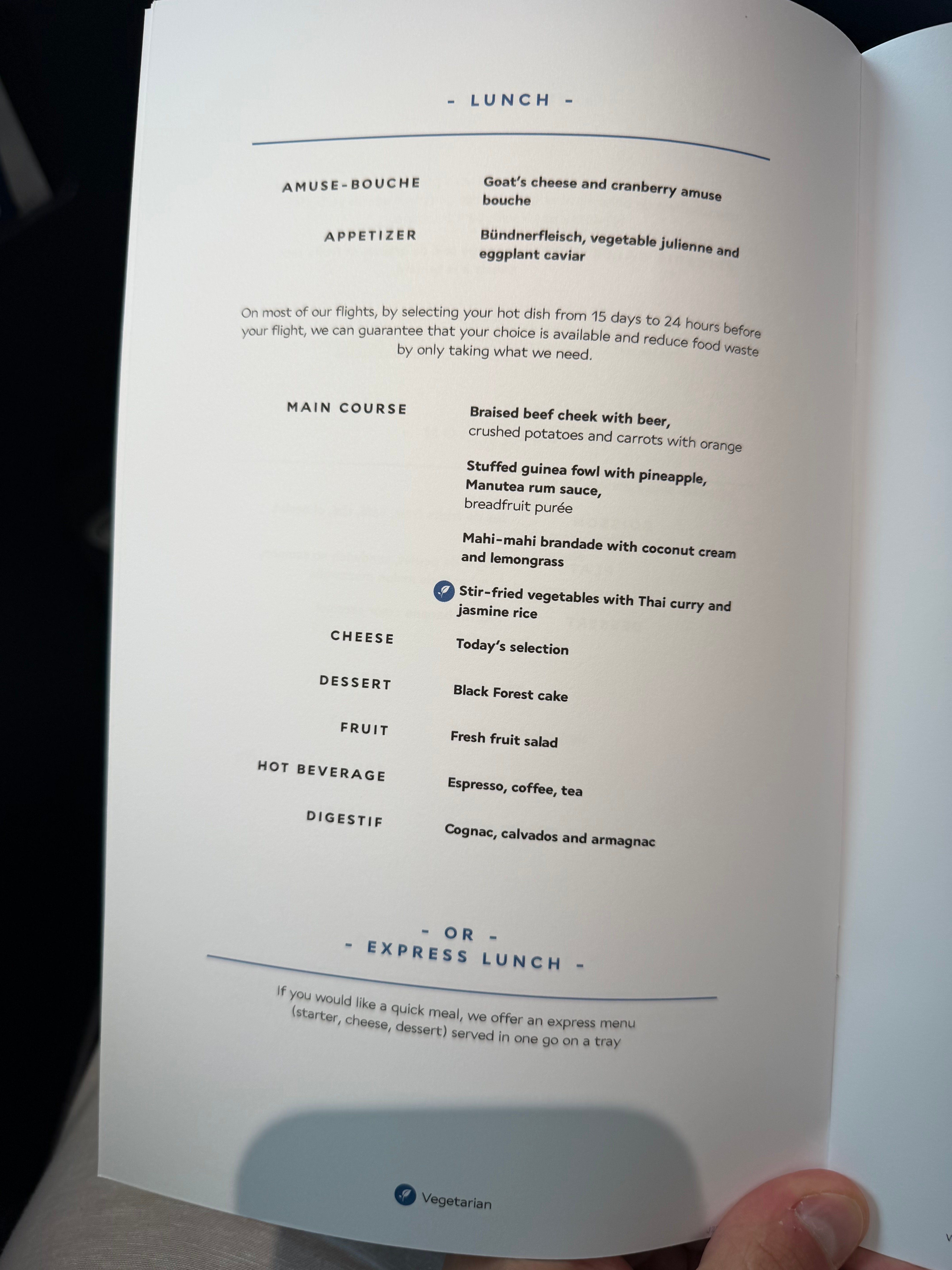 Closer view of the lunch menu and drinks listed with the meal.