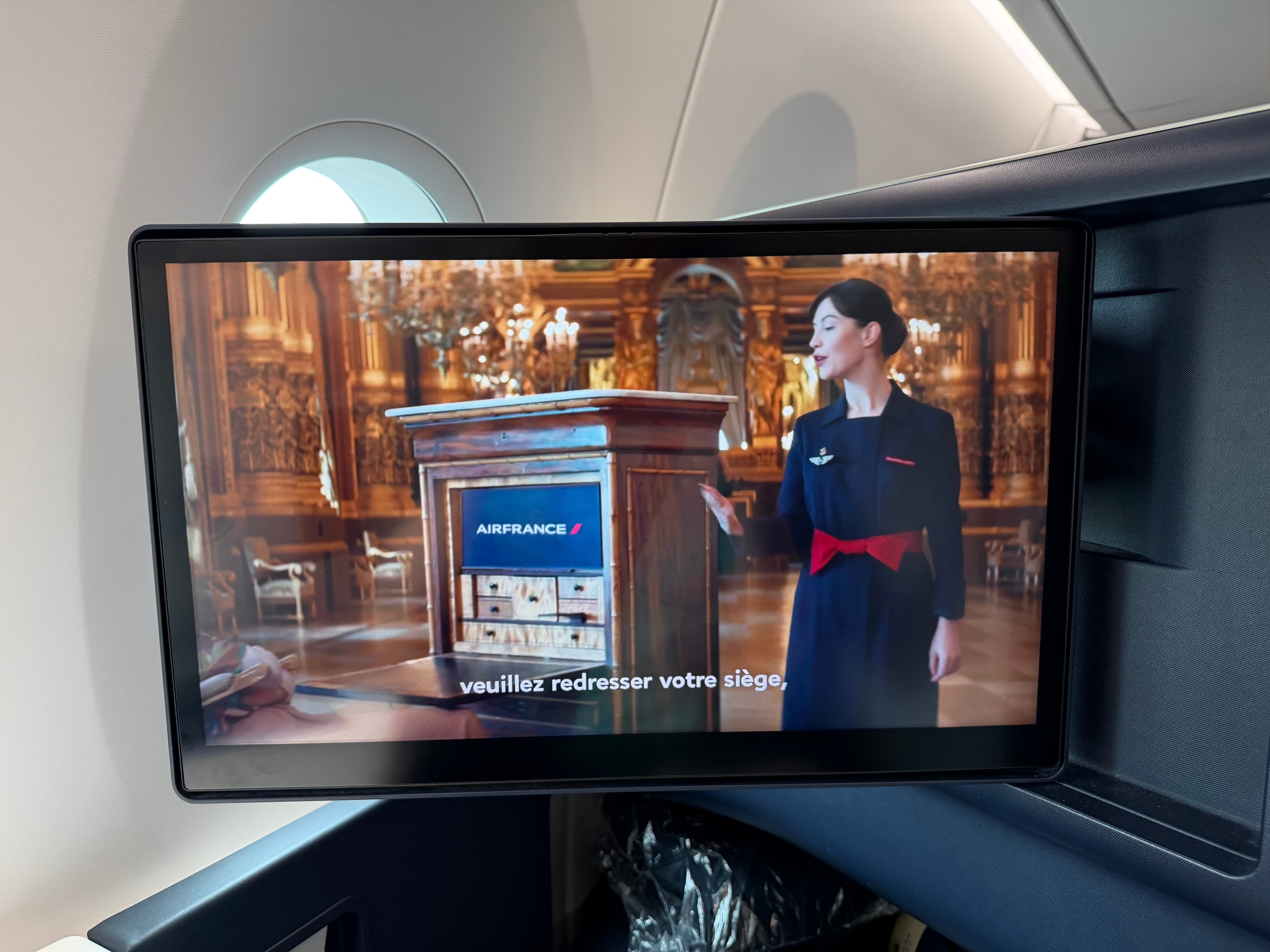 Air France safety video on the seat screen.