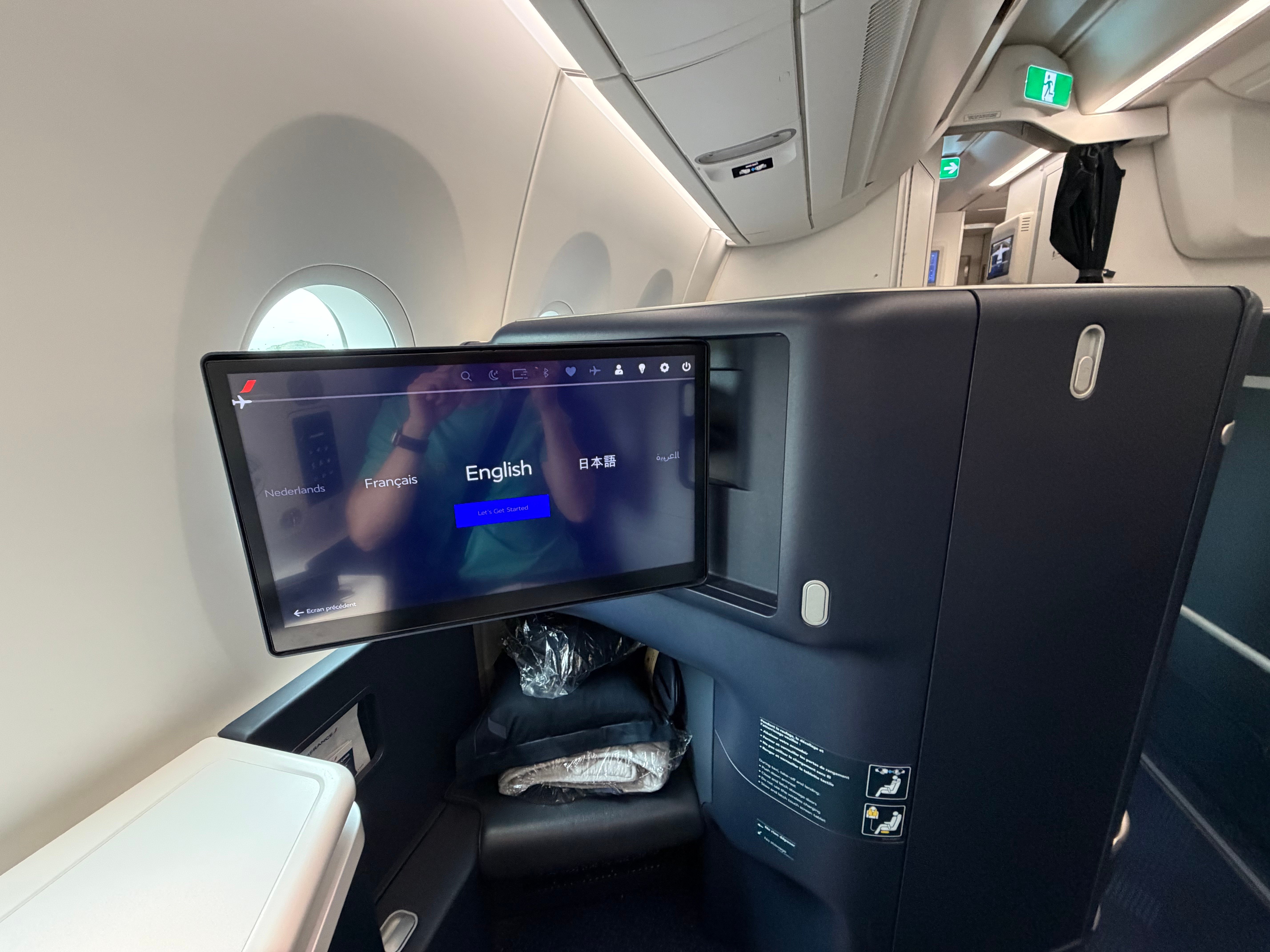 Large entertainment screen in a Business Class suite.