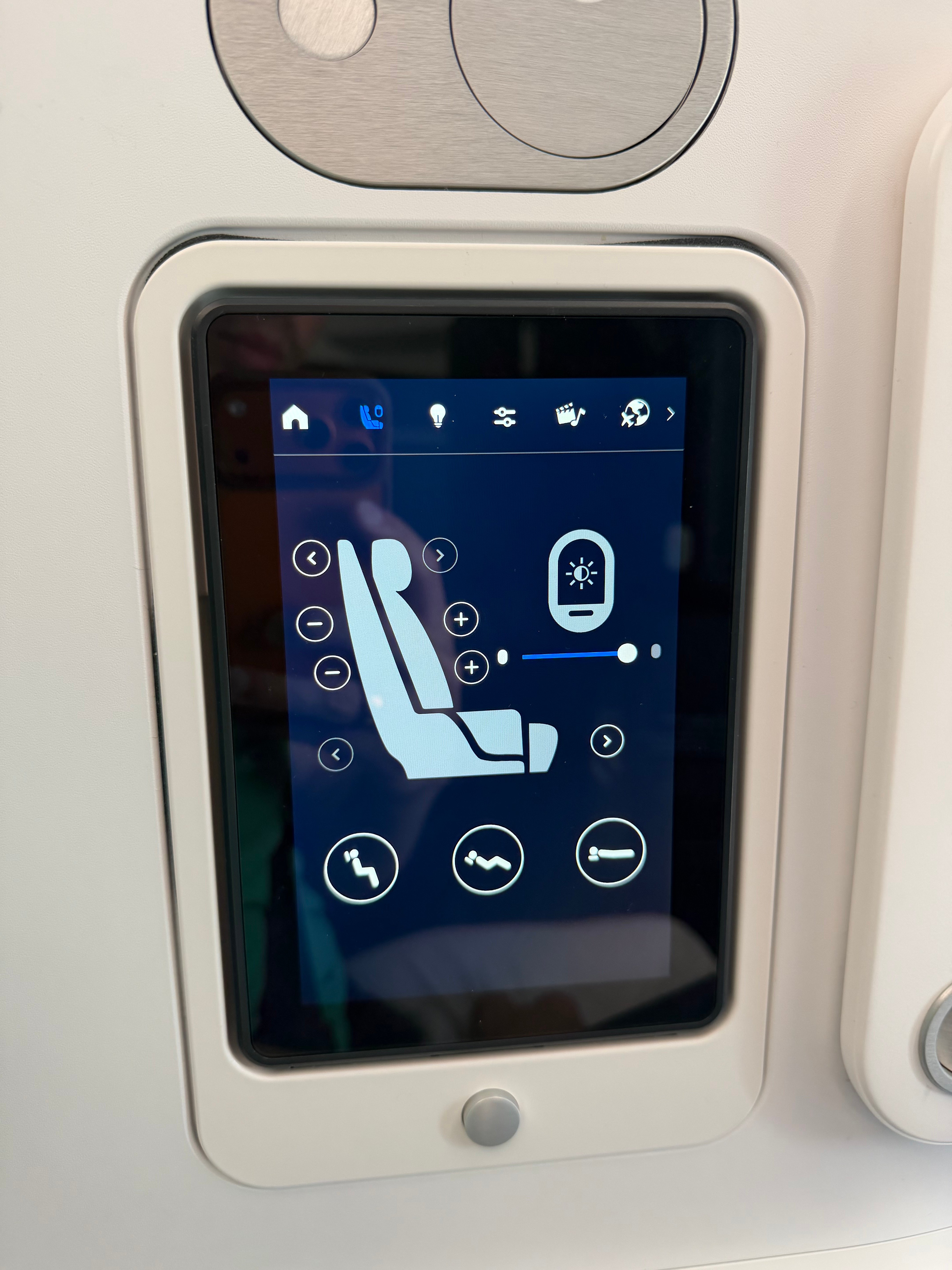 Touchscreen with seat and cabin controls.