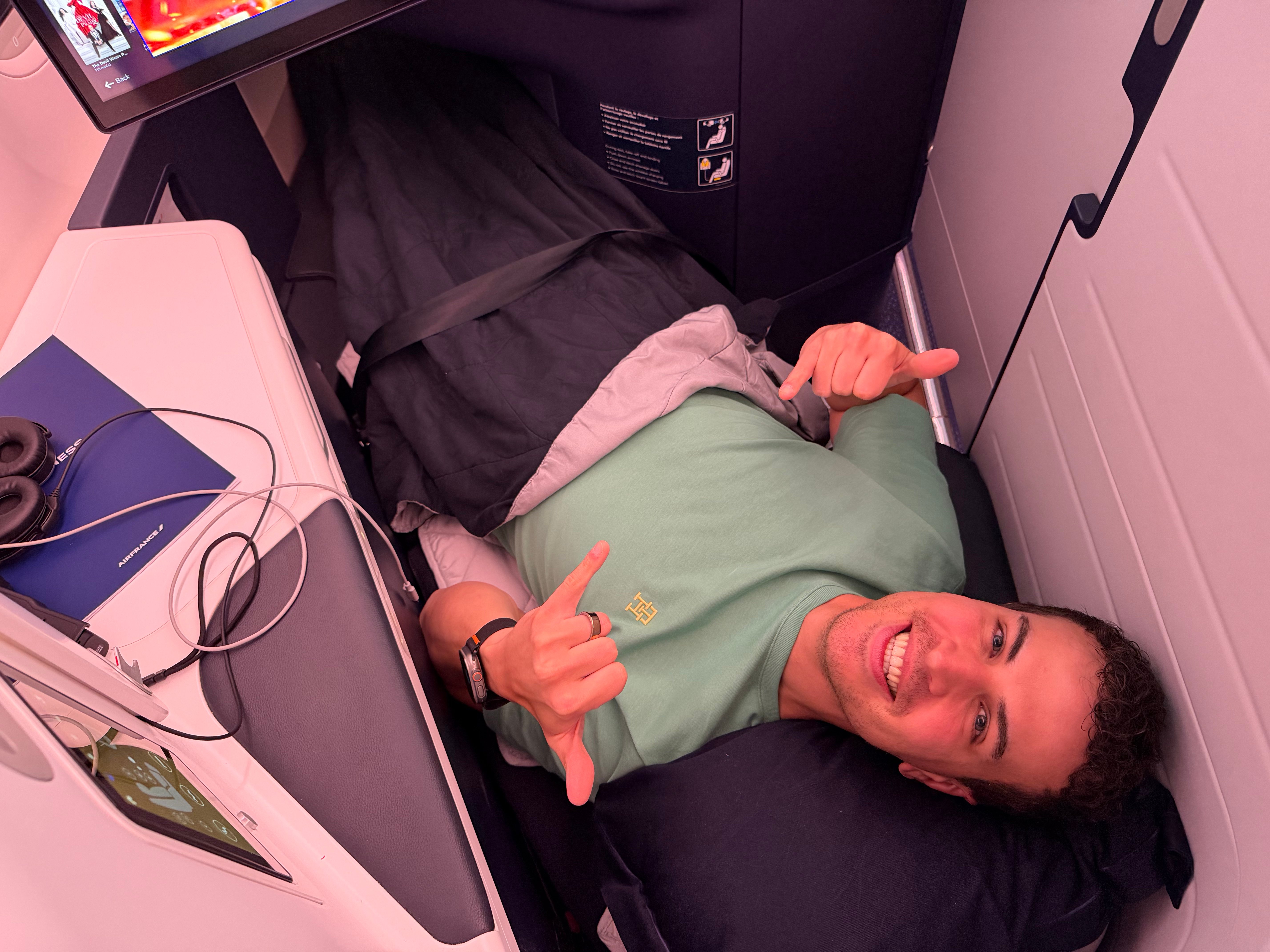 Me lying down in the Air France Business Class bed.