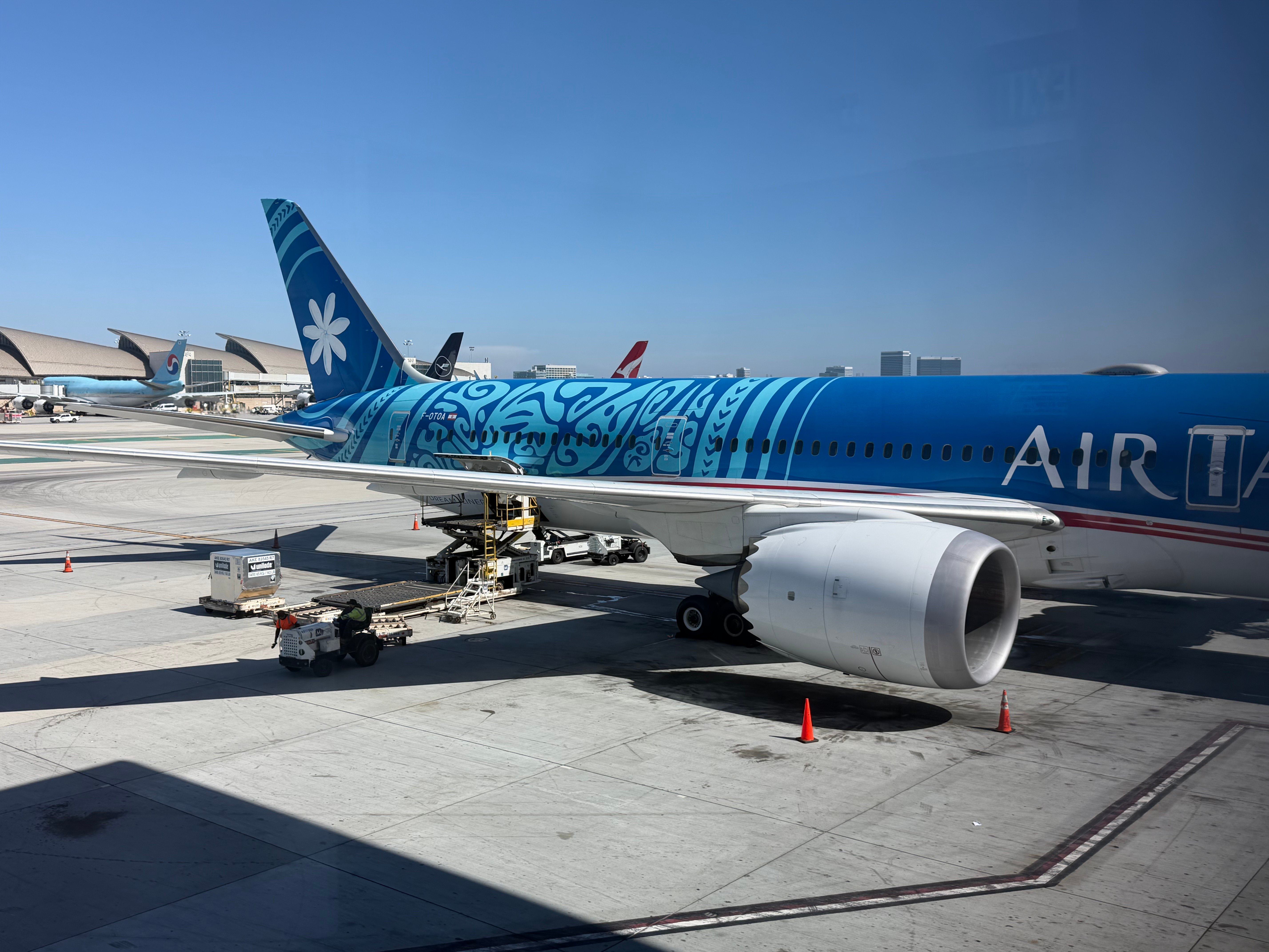 Air Tahiti Nui Boeing 787-9 parked at the gate in Los Angeles.