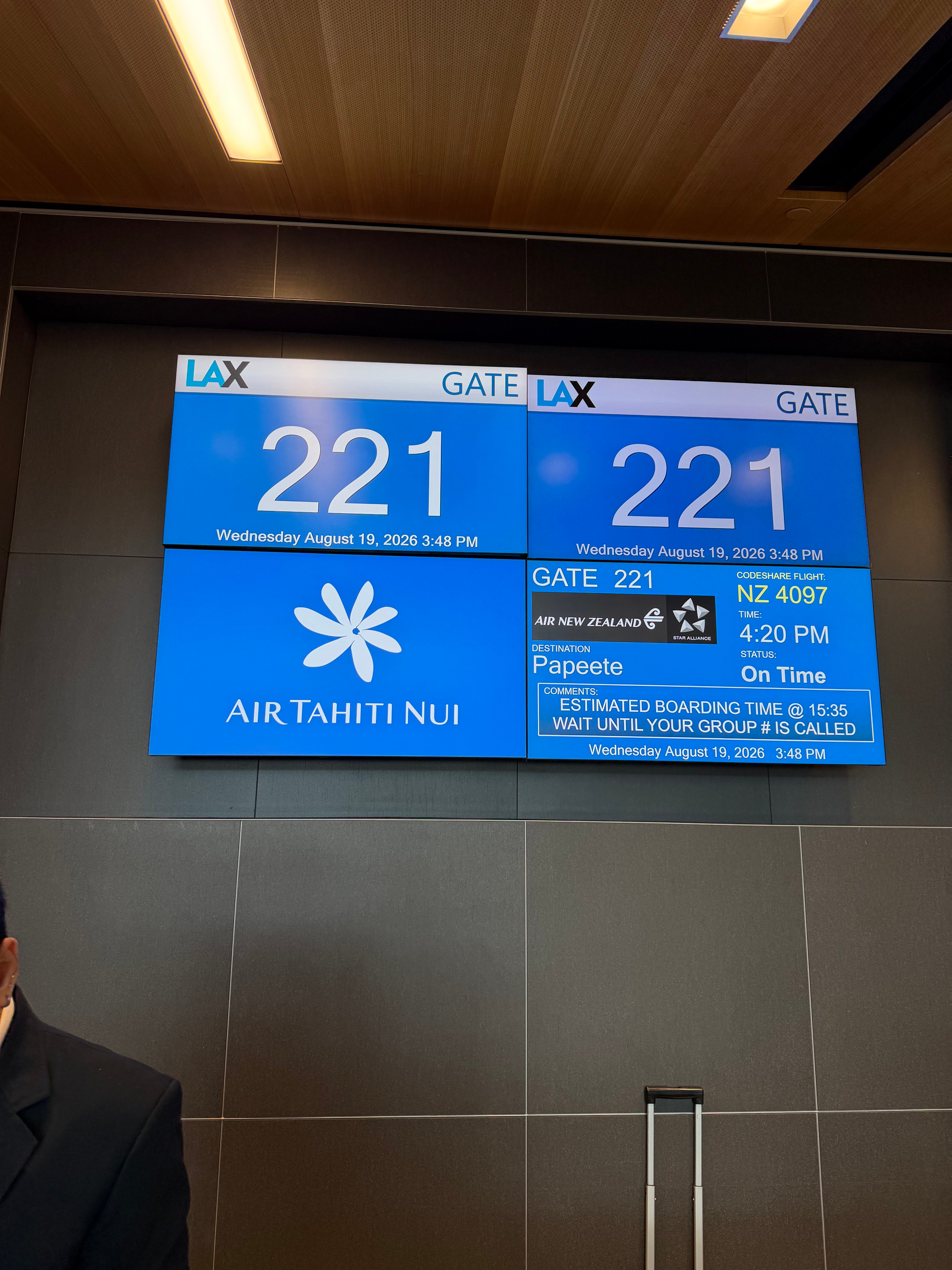 Air Tahiti Nui boarding screens for flight TN7 to Papeete.