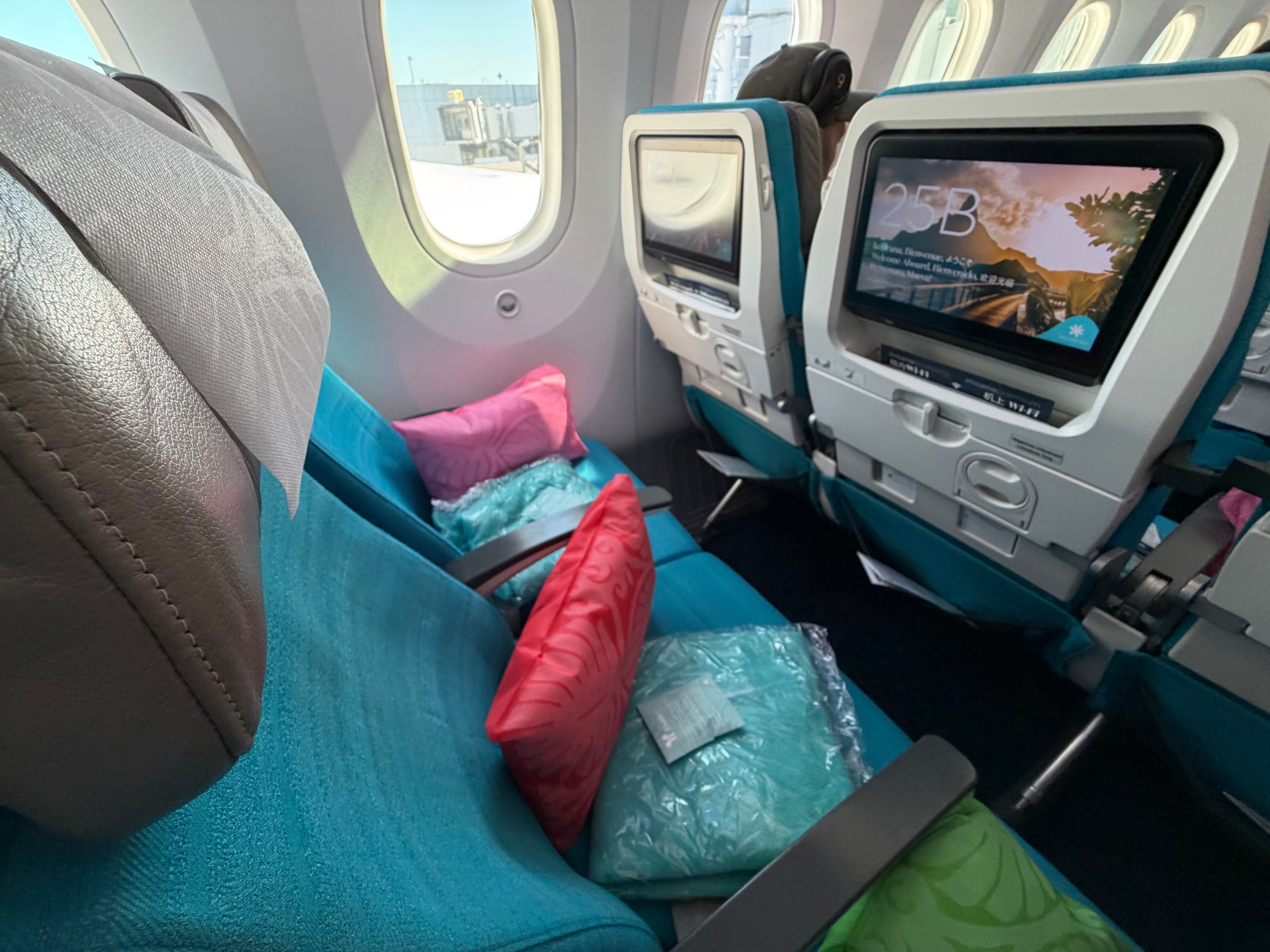 Air Tahiti Nui Moana Economy window seats with seatback screens.
