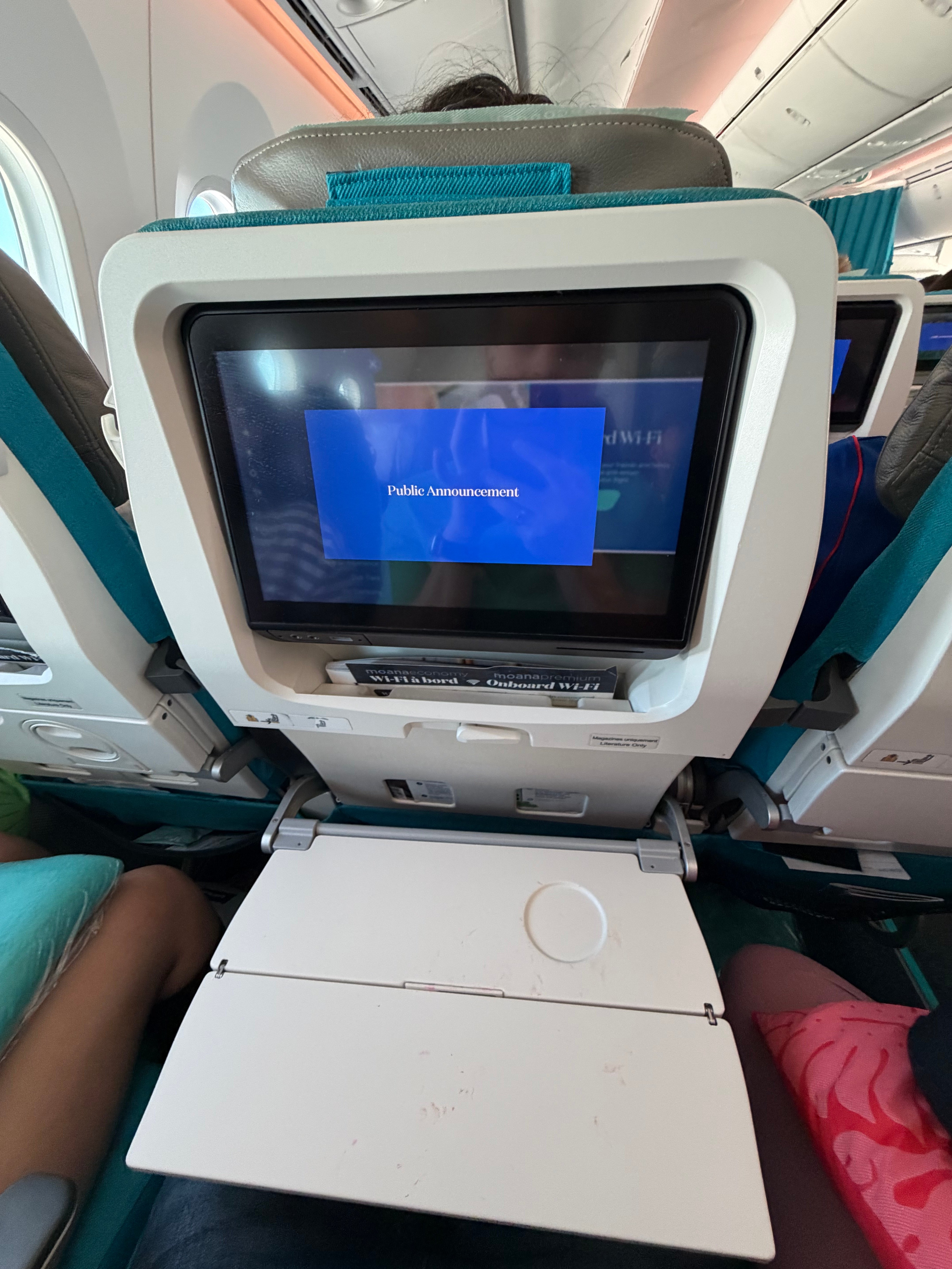 Air Tahiti Nui Economy tray table fully open.